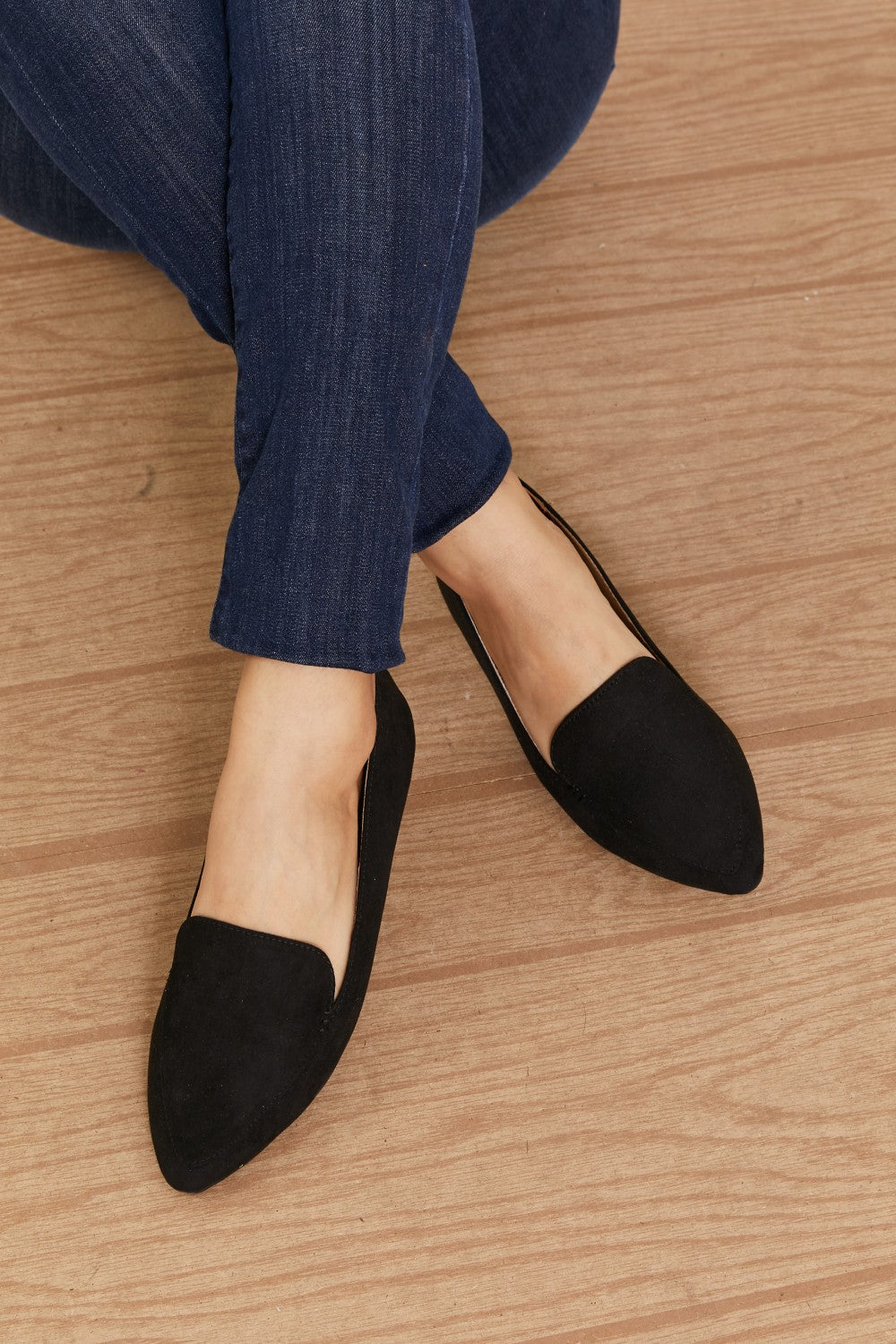 A pair of Big Dreams Ballerina Loafers in vegan suede, featuring a sophisticated point toe design, displayed in a studio flat lay.