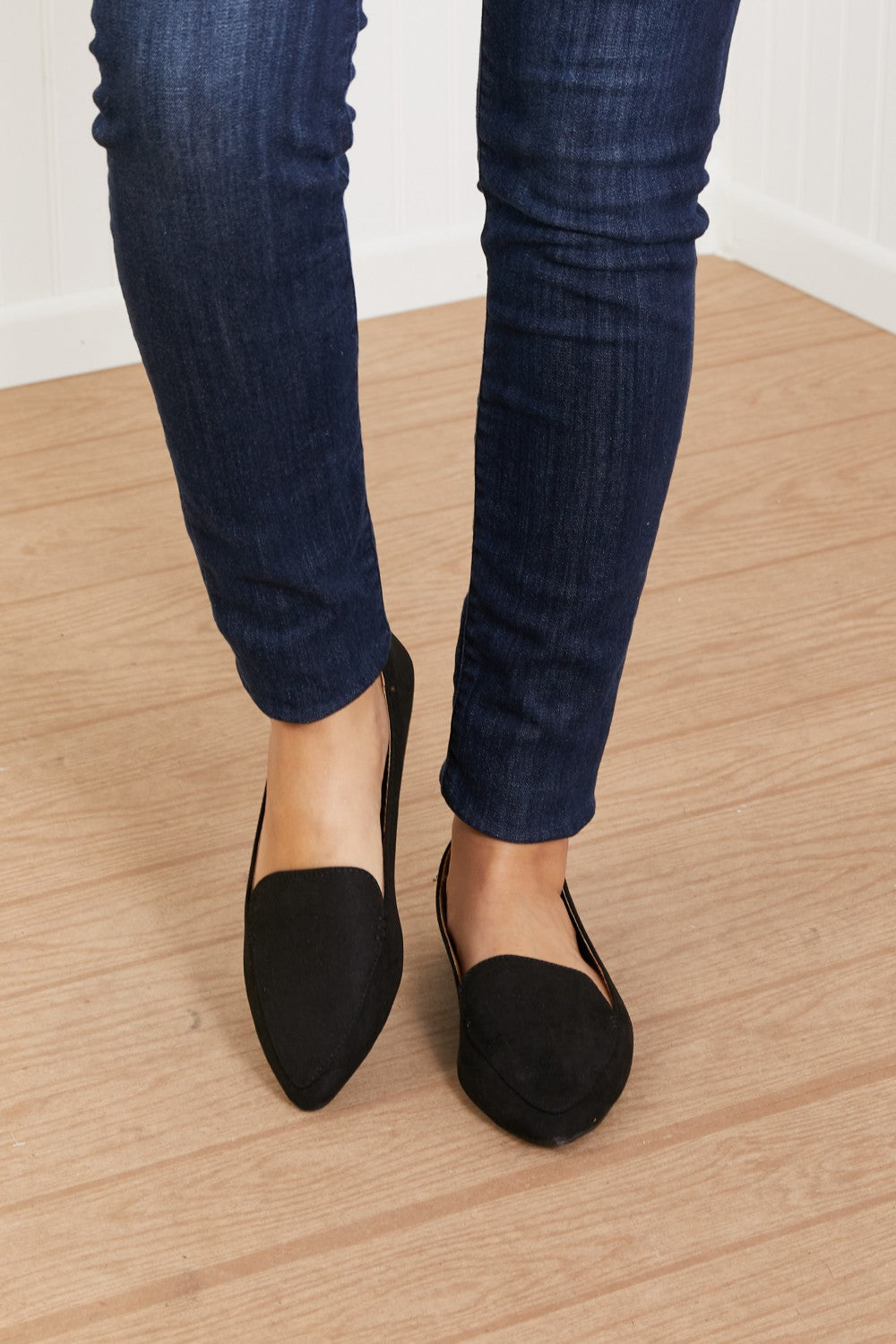 A pair of Big Dreams Ballerina Loafers in vegan suede, featuring a sophisticated point toe design, displayed in a studio flat lay.