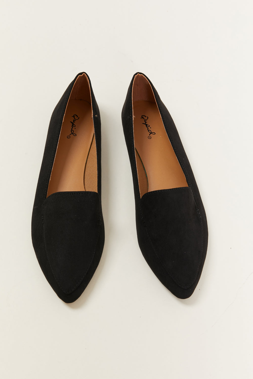 A pair of Big Dreams Ballerina Loafers in vegan suede, featuring a sophisticated point toe design, displayed in a studio flat lay.