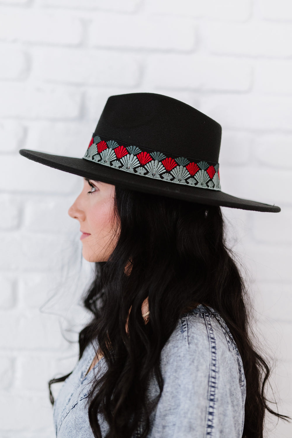 A stylish Biggest Fan Geometric Strap Fedora featuring a wide brim and adjustable ribbon, perfect for fashion-forward individuals.