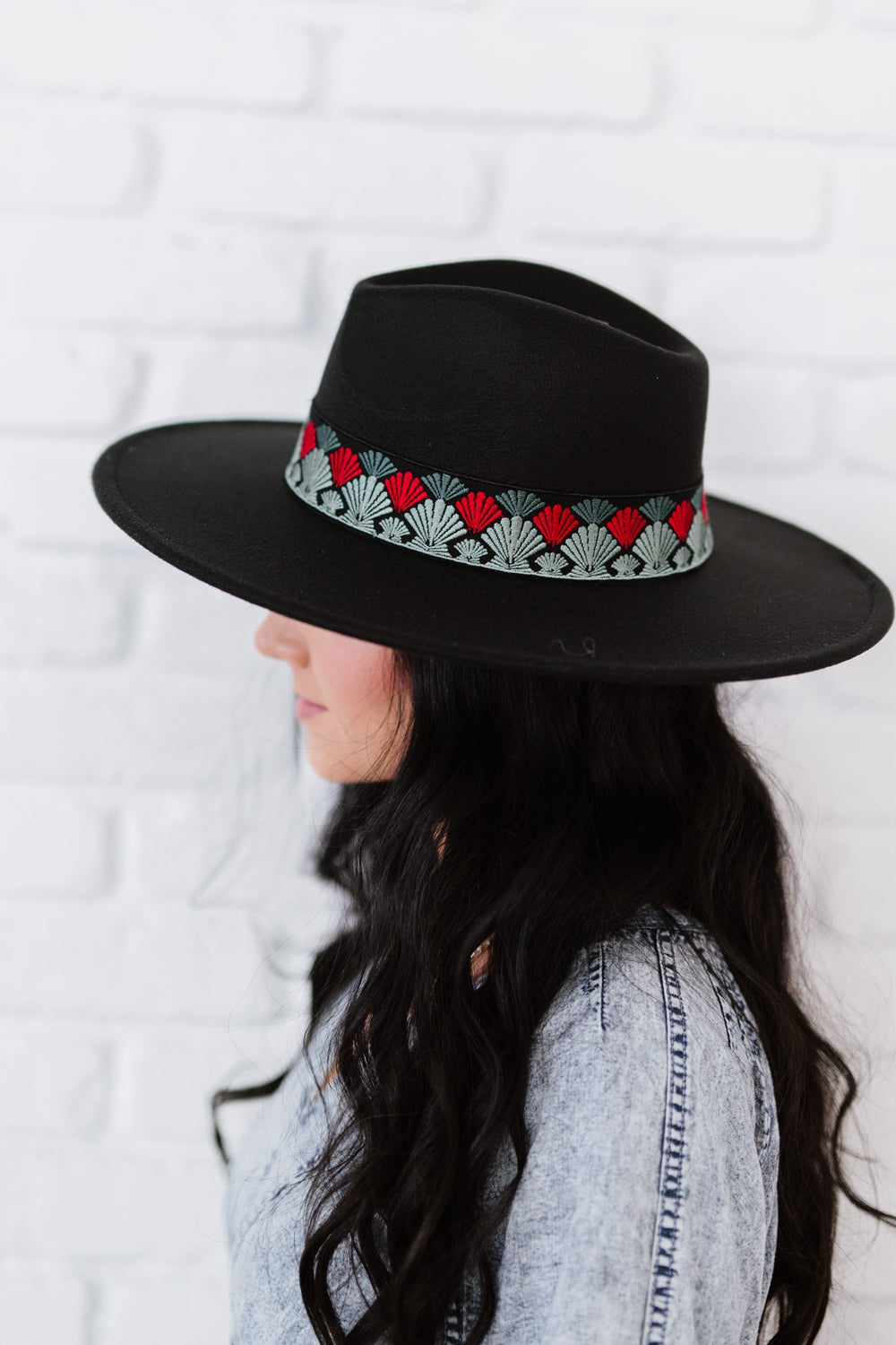 A stylish Biggest Fan Geometric Strap Fedora featuring a wide brim and adjustable ribbon, perfect for fashion-forward individuals.