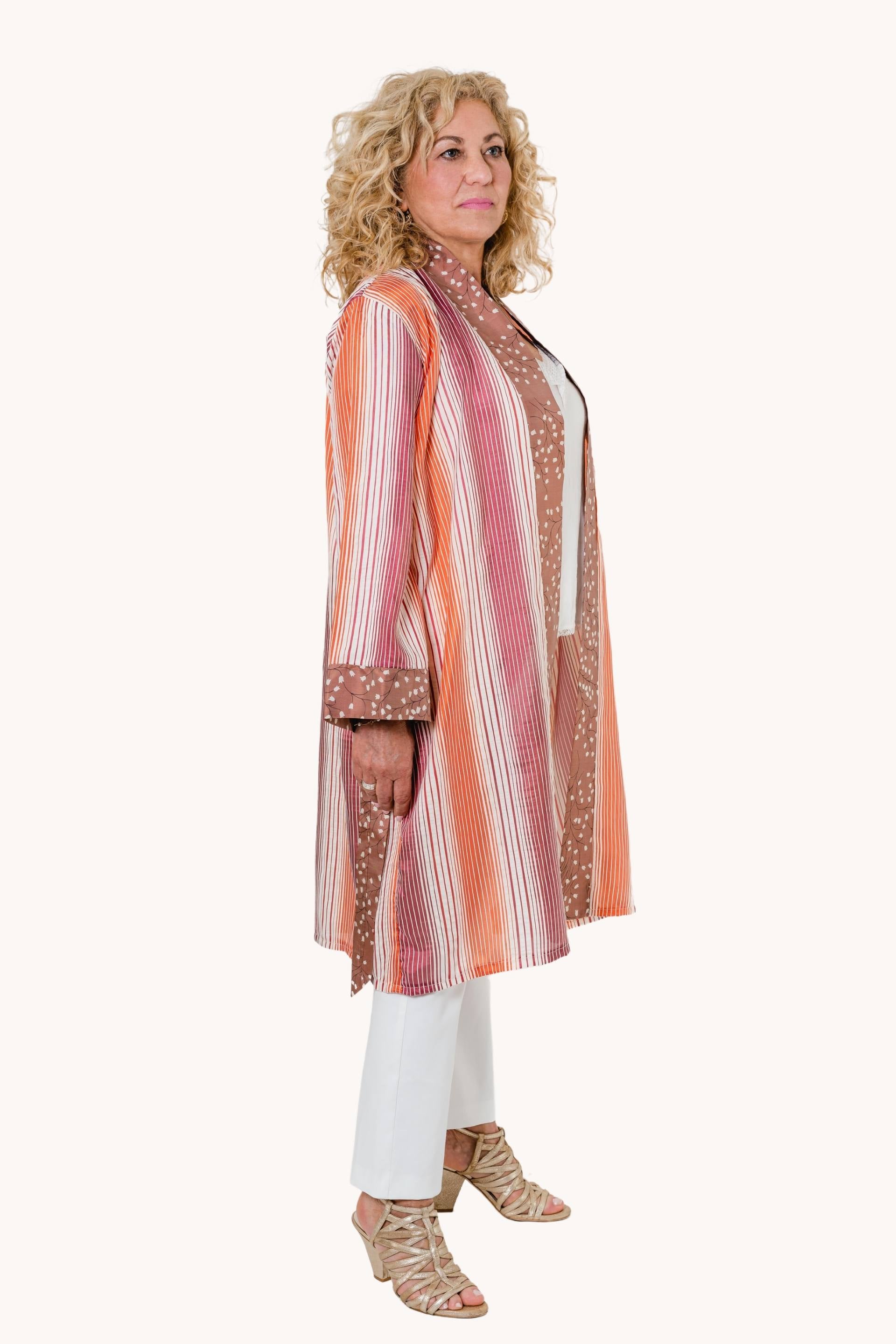 Biserialis striped kimono featuring jacquard-taffeta fabric with floral pattern collar, belt, and wrist details.