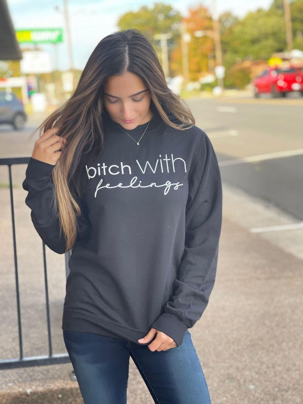 Bitch With Feelings Sweatshirt featuring a humorous design, made from a soft cotton-polyester blend, suitable for unisex wear.