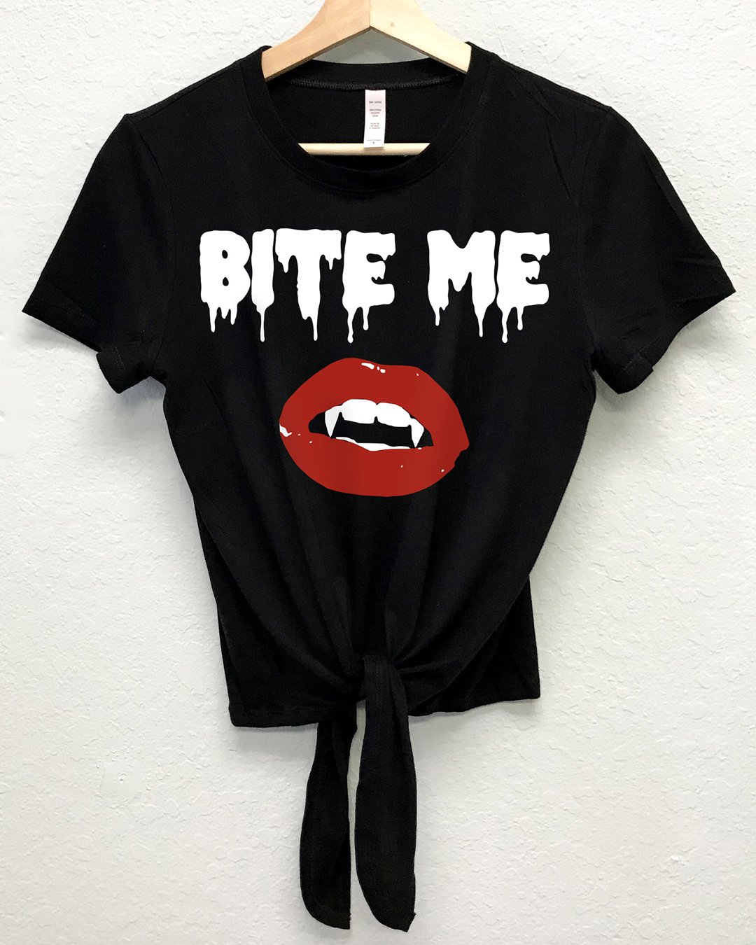 BITE ME Halloween Shirt featuring vampire lips design, available in T-shirt and crop top styles.