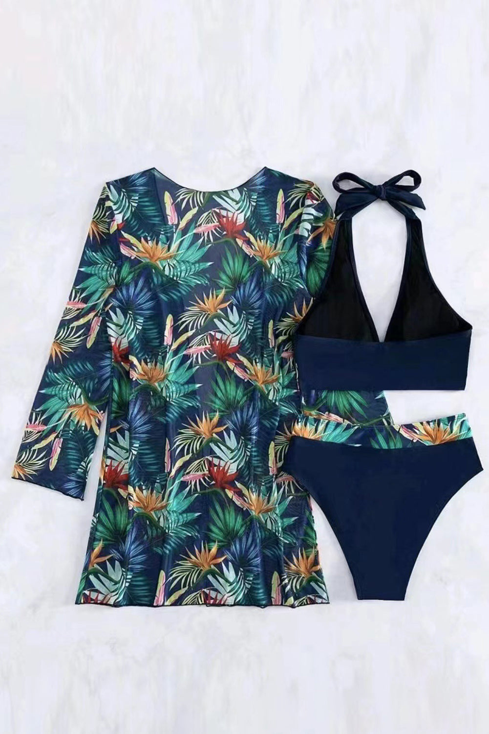 Black 3pcs Tropical Contrast Trim Halter Bikini Set with Cover Up featuring vibrant tropical print and stylish contrast trim.