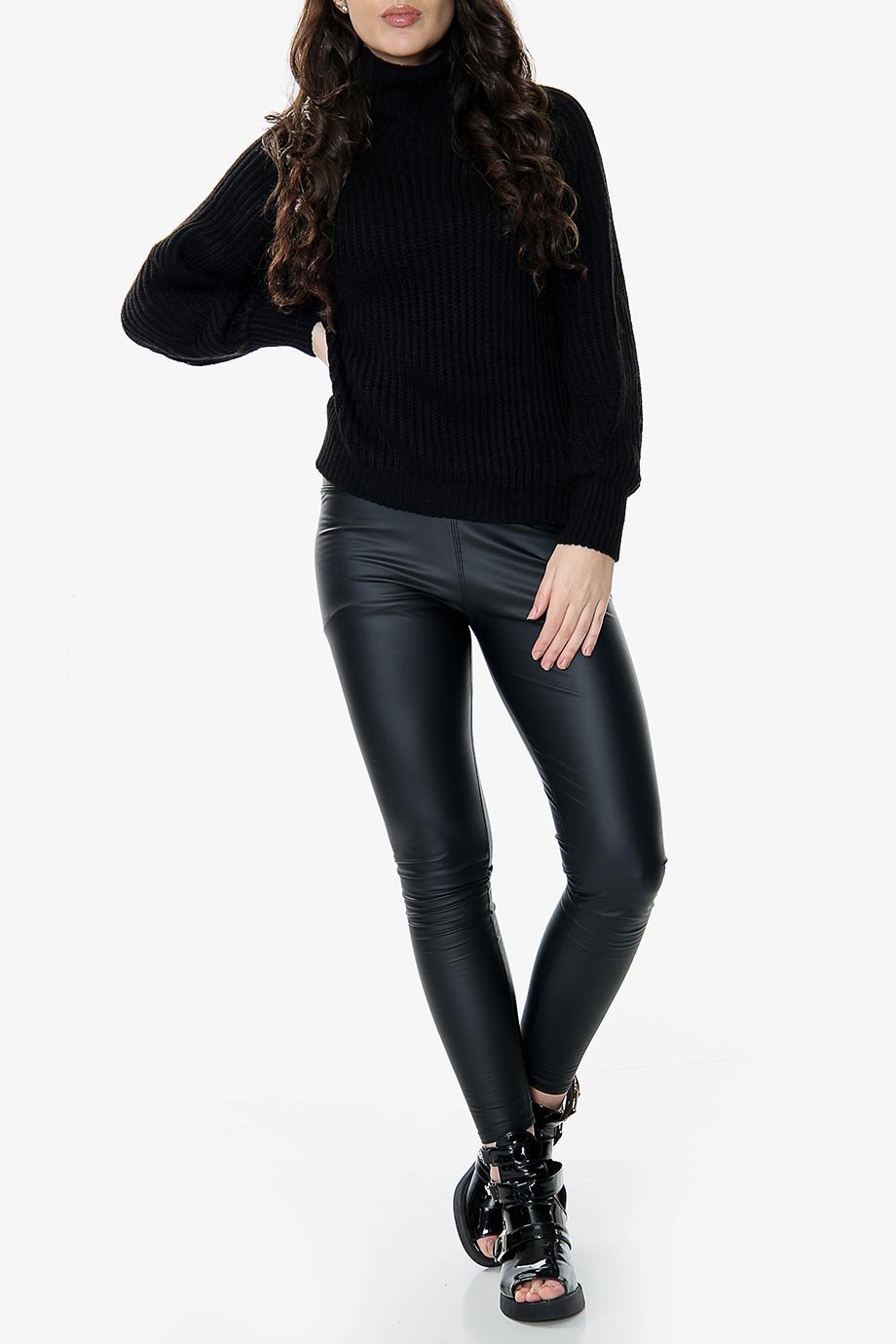 A stylish black balloon sleeve knit jumper with a high neck, made from soft acrylic yarn, perfect for casual and formal occasions.