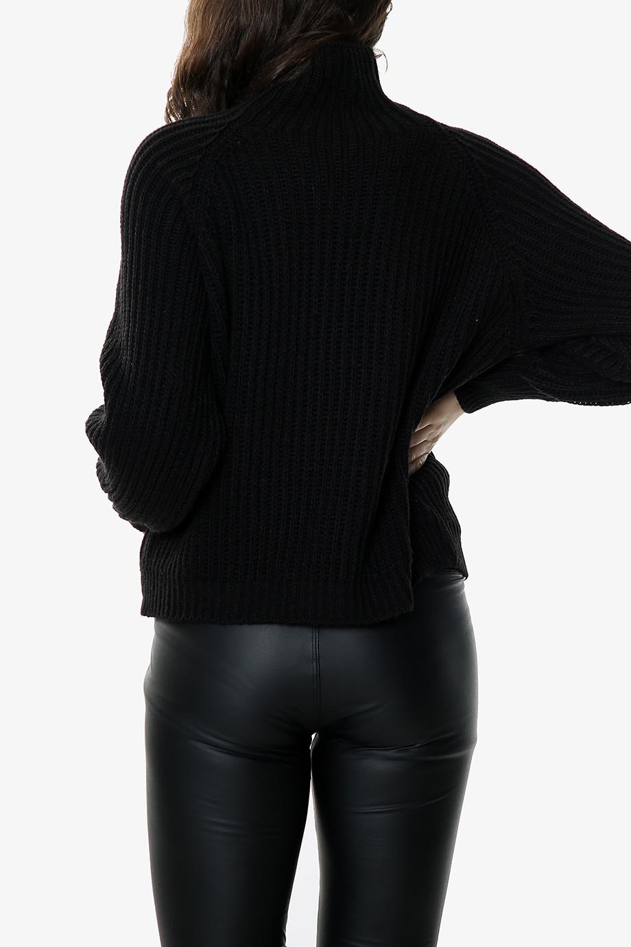 A stylish black balloon sleeve knit jumper with a high neck, made from soft acrylic yarn, perfect for casual and formal occasions.