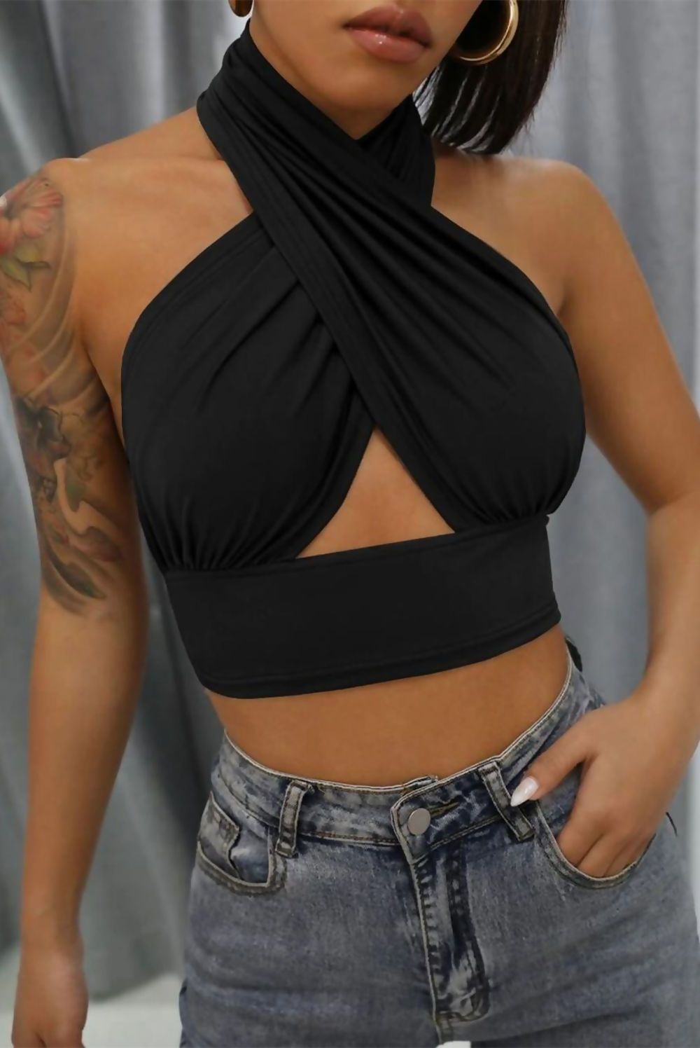 Black Cross Front Halter Neck Underbust Top showcasing a stylish design with underbust detail, perfect for trendy outfits.