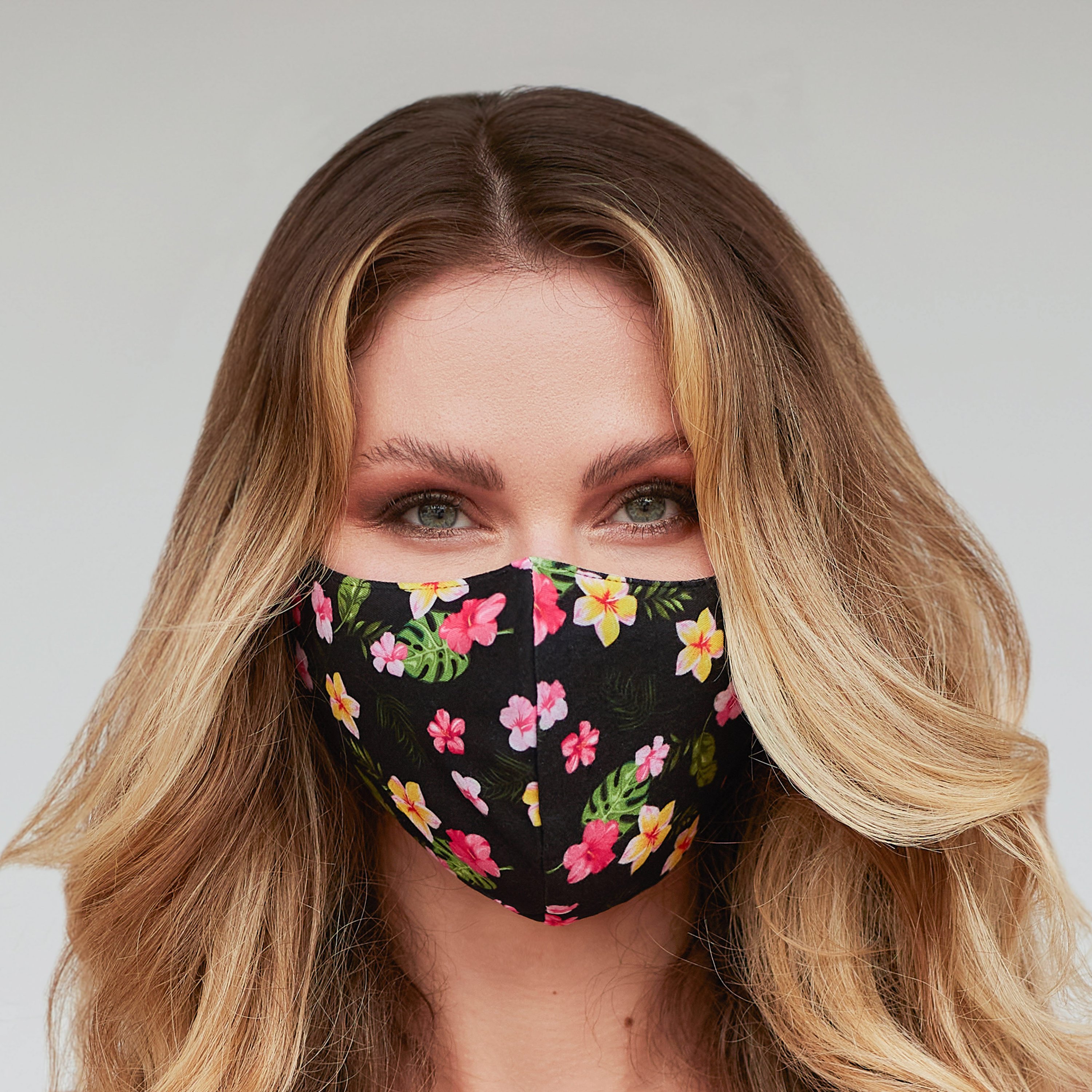 Black floral face mask with a stylish design, featuring a 3-layer construction for comfort and protection.