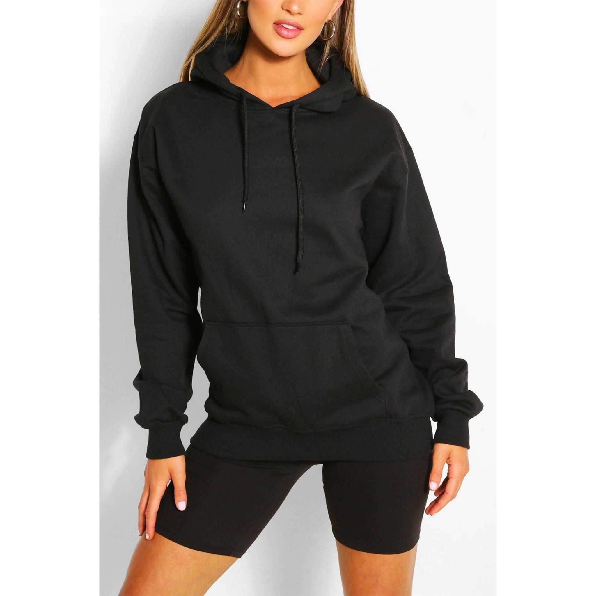 A stylish black oversized boyfriend hoodie displayed on a mannequin, showcasing its relaxed fit and soft fabric.