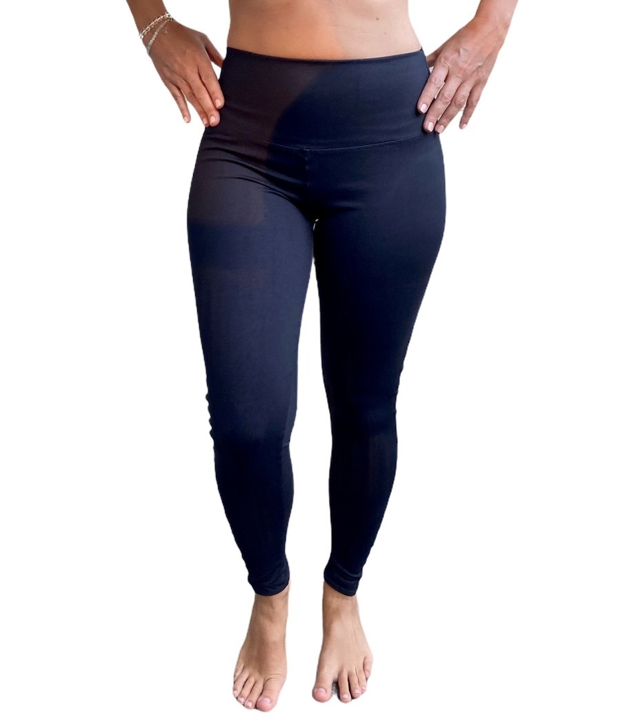 A pair of Black & Rainbow Macramé Yoga Leggings featuring a unique macramé design and a wide waistband, perfect for workouts and casual wear.