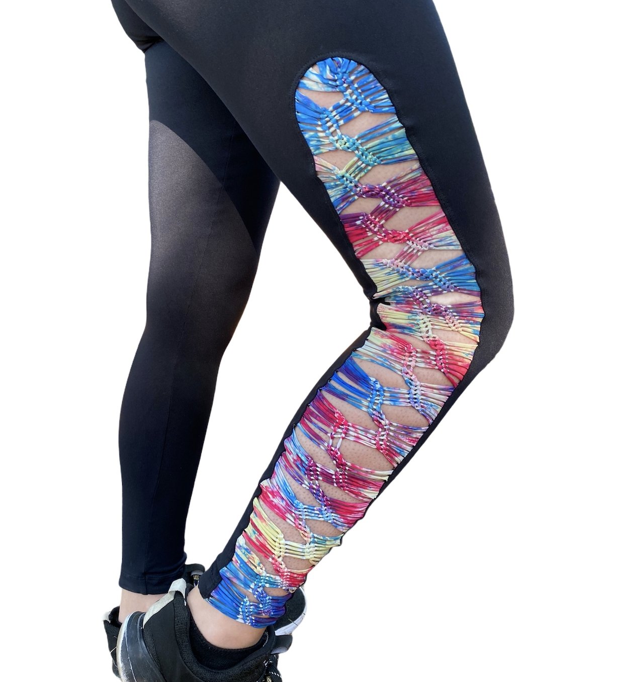 A pair of Black & Rainbow Macramé Yoga Leggings featuring a unique macramé design and a wide waistband, perfect for workouts and casual wear.