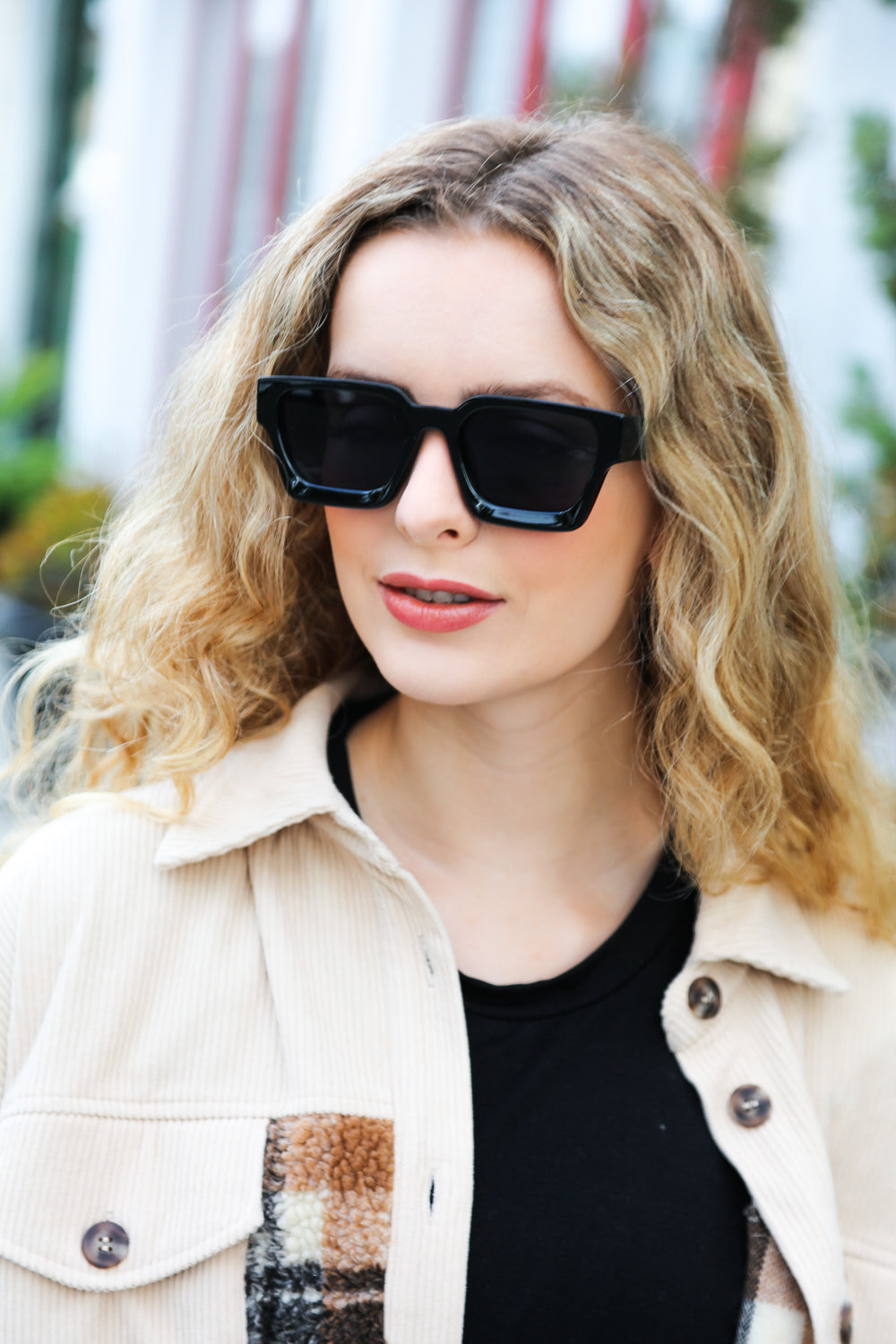 A pair of stylish black thick frame rectangle sunglasses with black tinted lenses and a keyhole bridge, perfect for unisex wear.