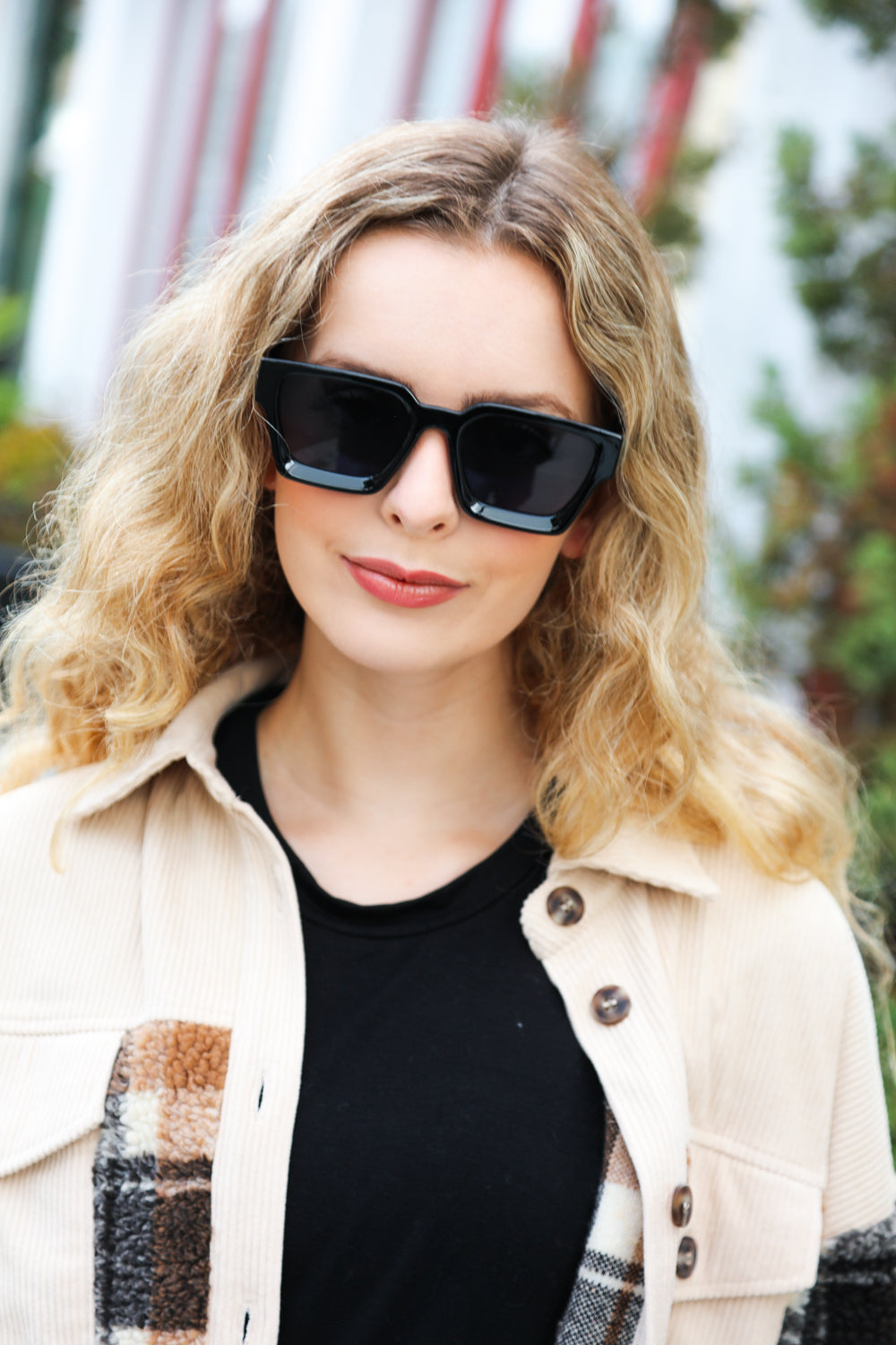 A pair of stylish black thick frame rectangle sunglasses with black tinted lenses and a keyhole bridge, perfect for unisex wear.