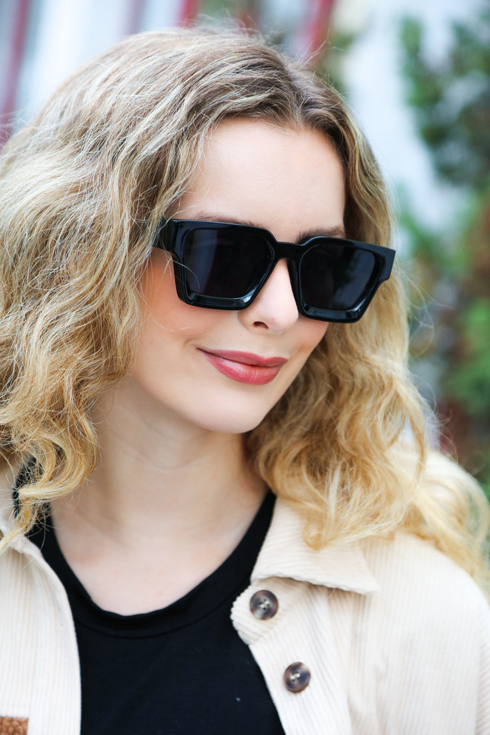 A pair of stylish black thick frame rectangle sunglasses with black tinted lenses and a keyhole bridge, perfect for unisex wear.