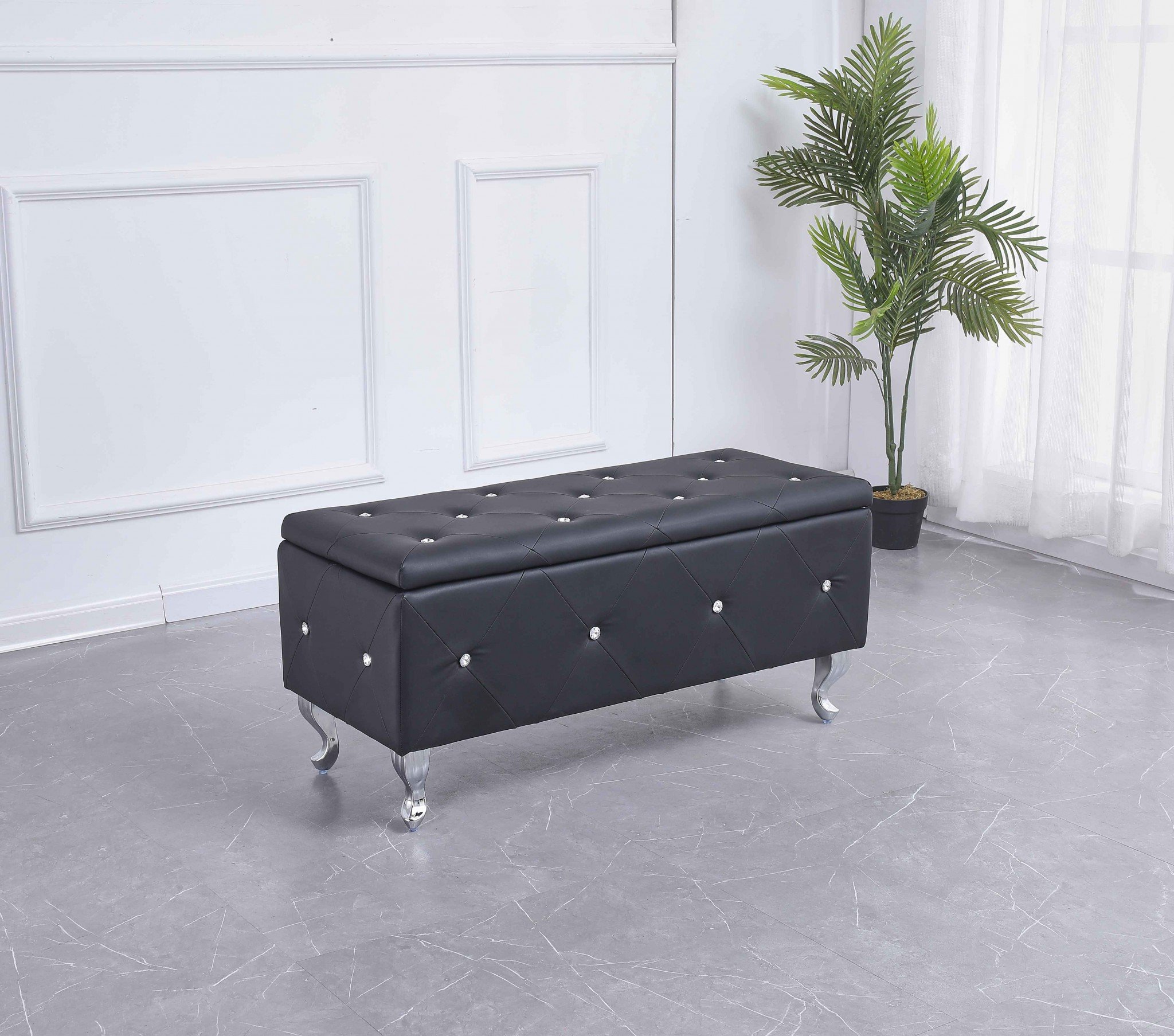 Black tufted hard wood storage bench with padded top and crystal tufting, ideal for stylish storage and seating.