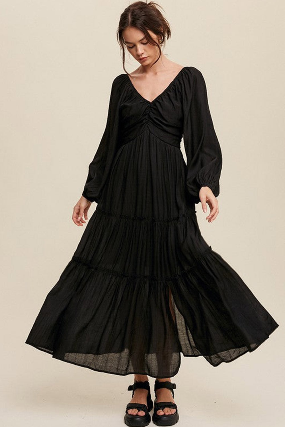 Elegant Black V Neck Bowknot Cutout Frill Tiered Maxi Dress showcasing a flattering neckline and ruffled details.