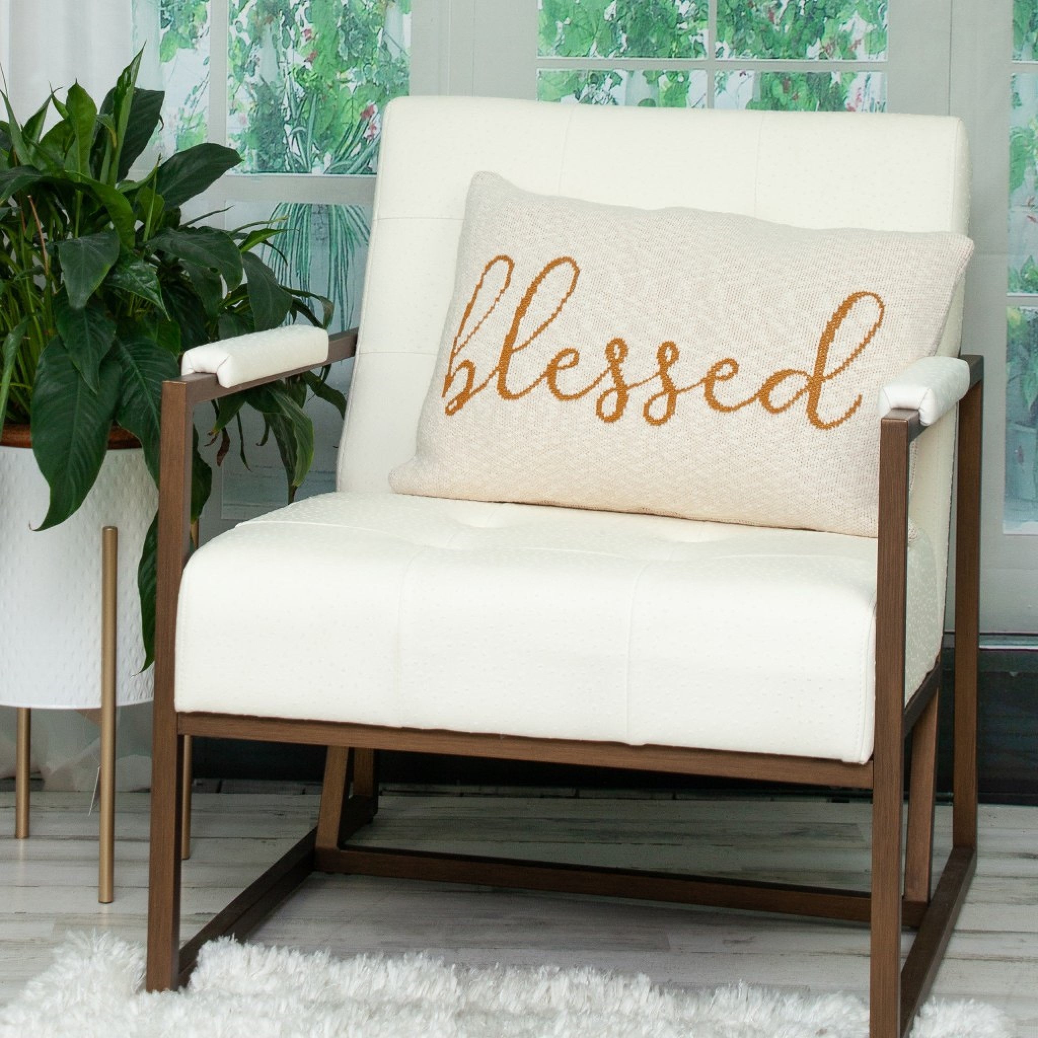 Blessed Carmel Throw Pillow with cream backdrop and caramel cursive text, perfect for home decor.