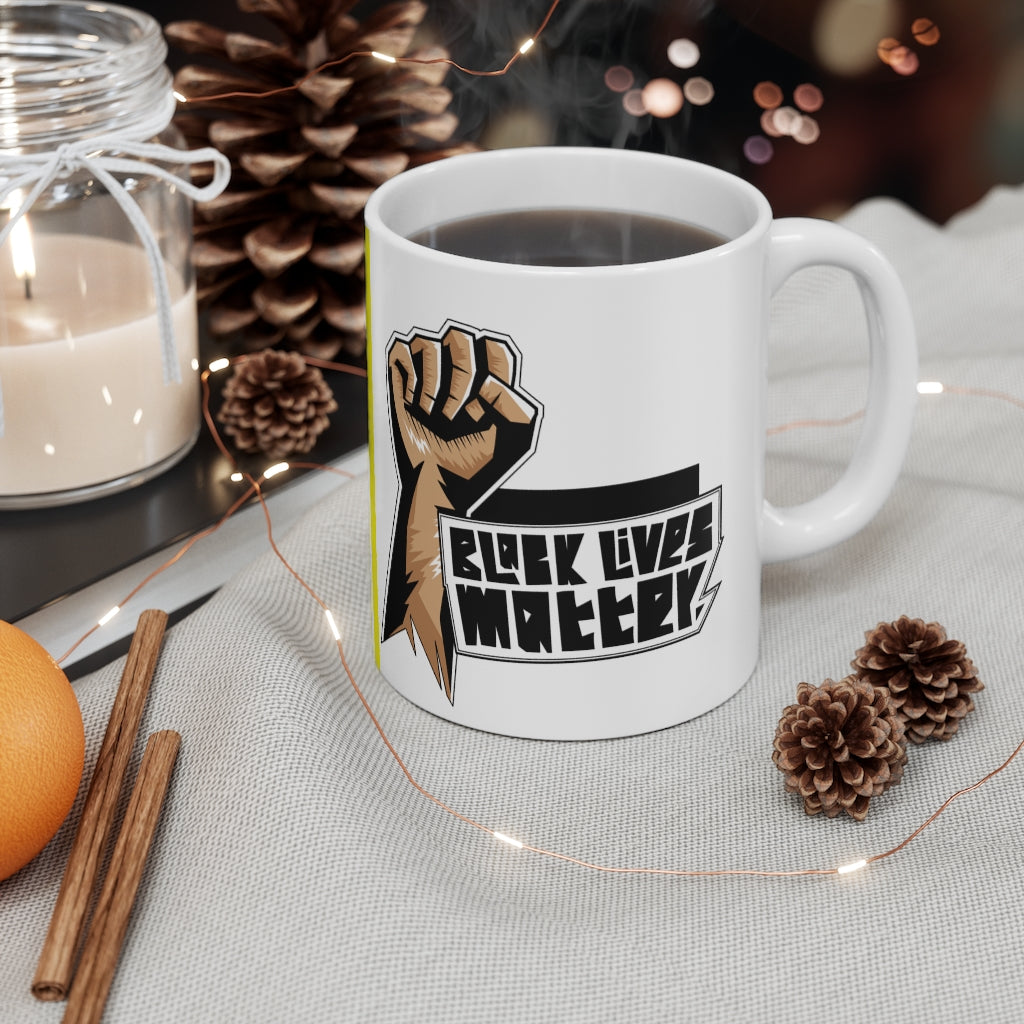 BLM 11oz Mug made of white ceramic with a C-handle, perfect for coffee and tea lovers.