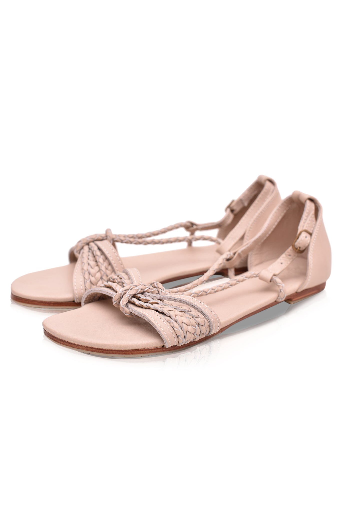 A pair of Blooming Day Strappy Sandals featuring intricately woven leather straps and a buckle closure, perfect for summer occasions.