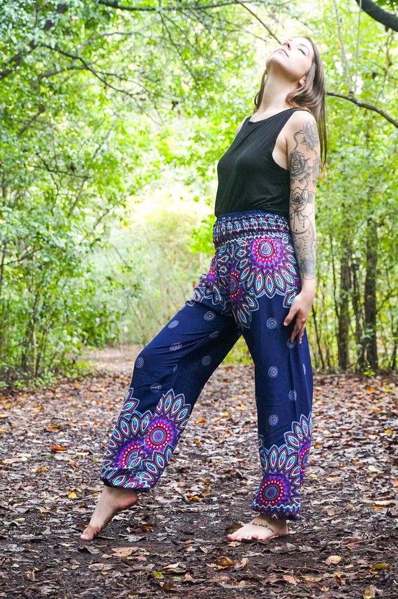 Person in colorful pants outdoors.