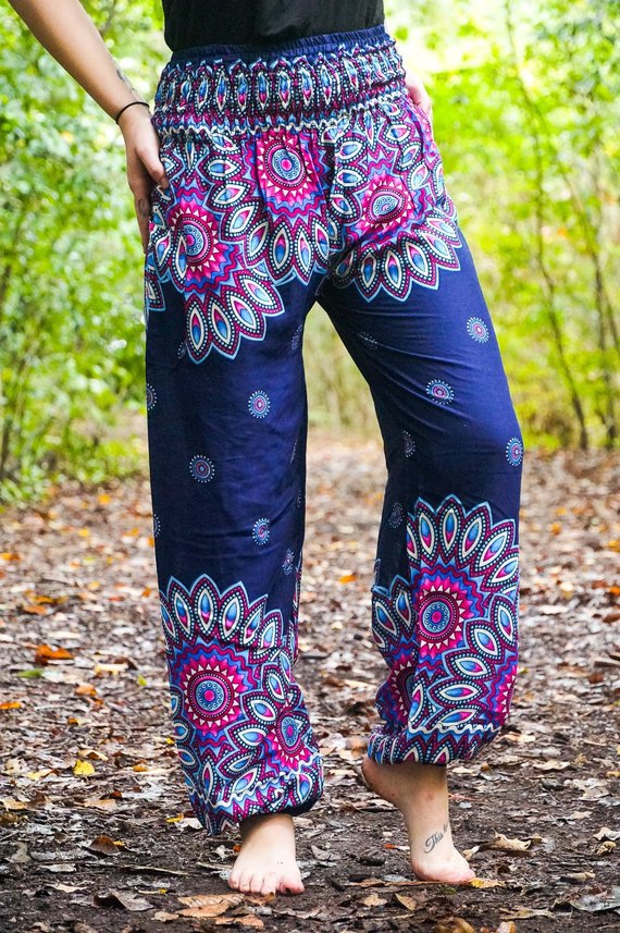 Colorful bohemian pants in woods.