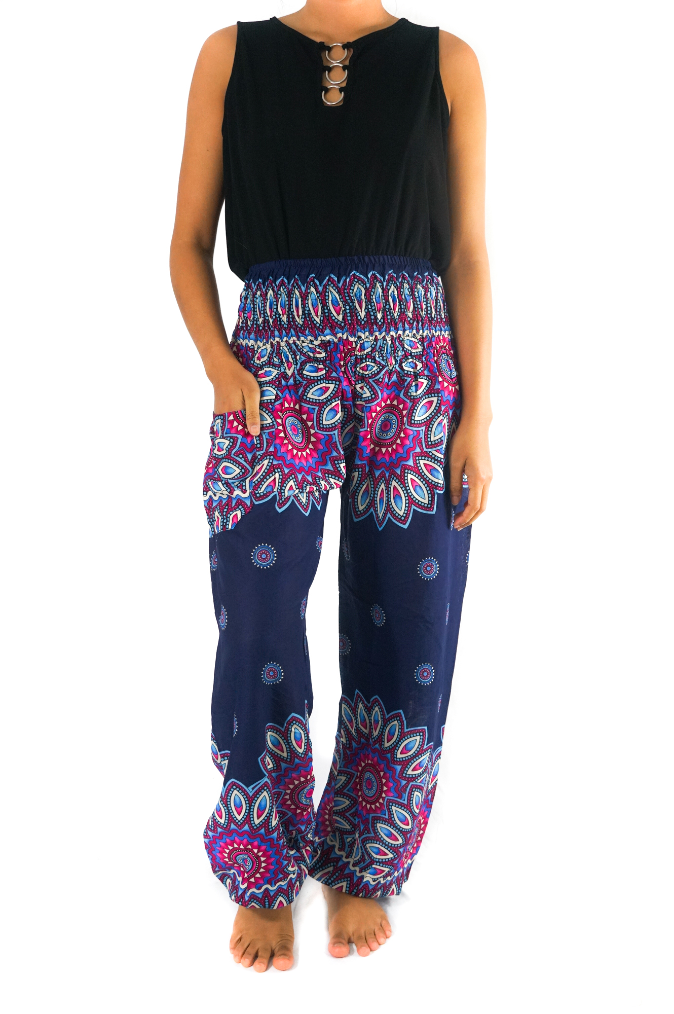 Person wearing colorful harem pants.