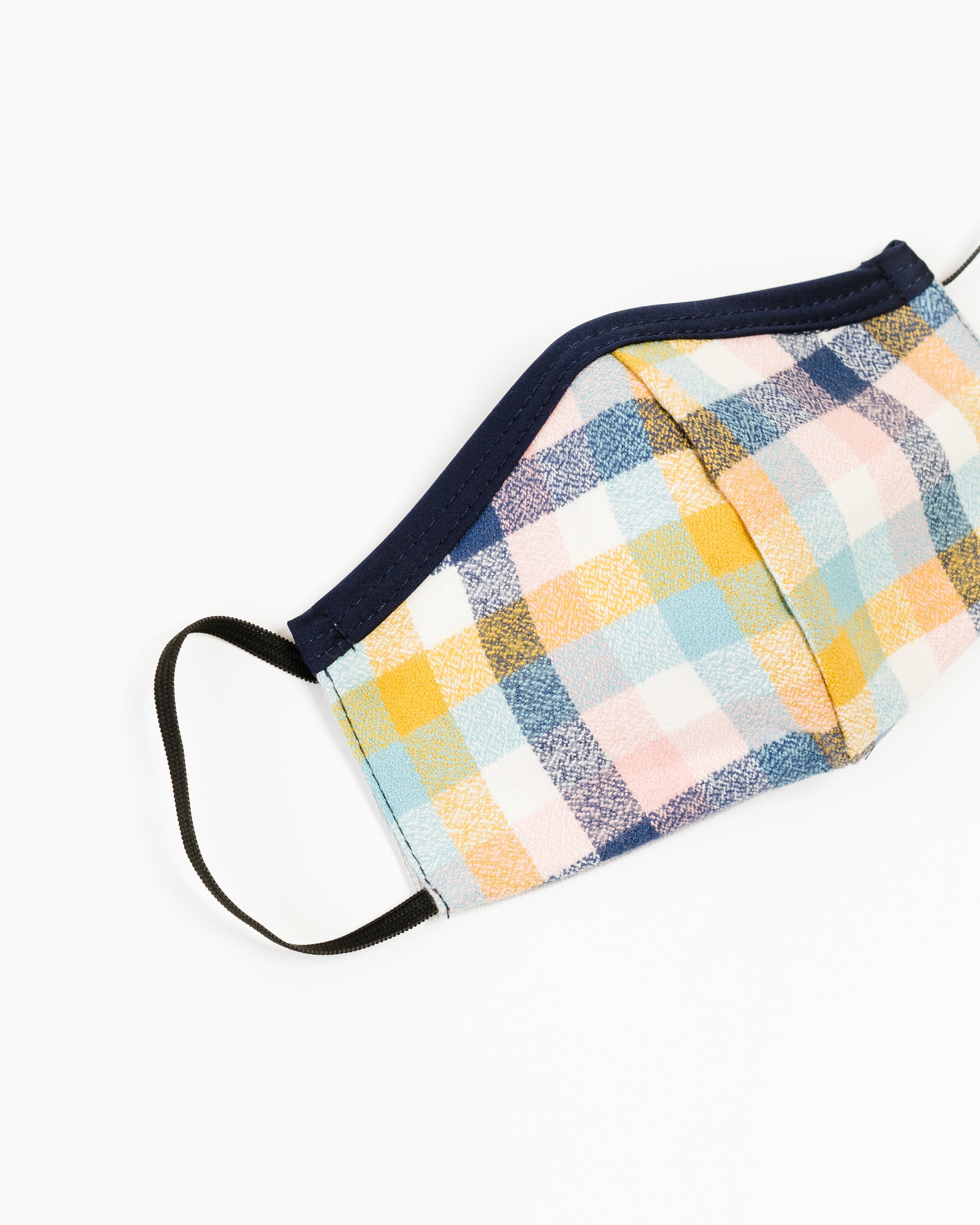 Blush Flannel Face Mask made of soft cotton with unique printed designs, featuring elastic straps for a secure fit.