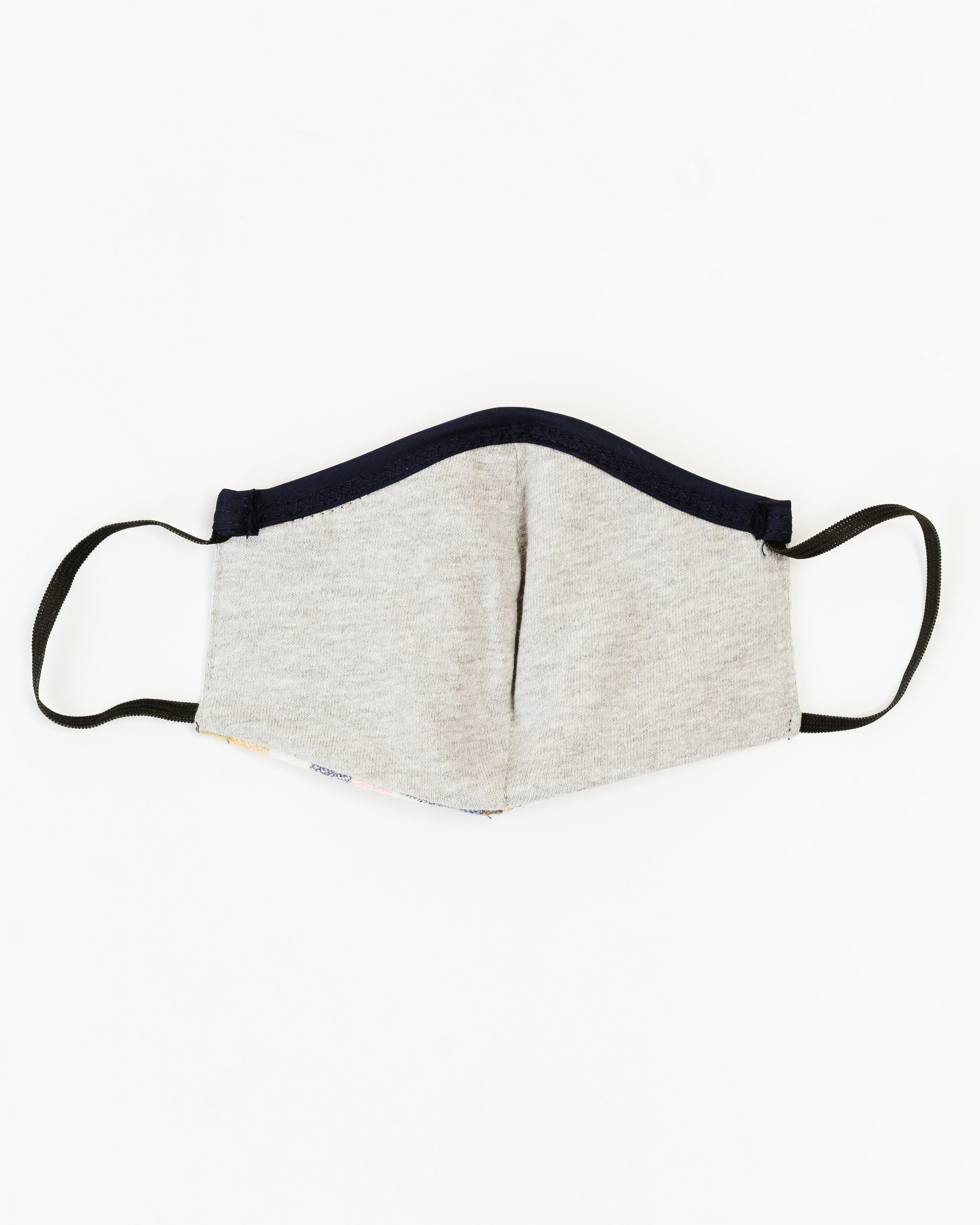 Blush Flannel Face Mask made of soft cotton with unique printed designs, featuring elastic straps for a secure fit.