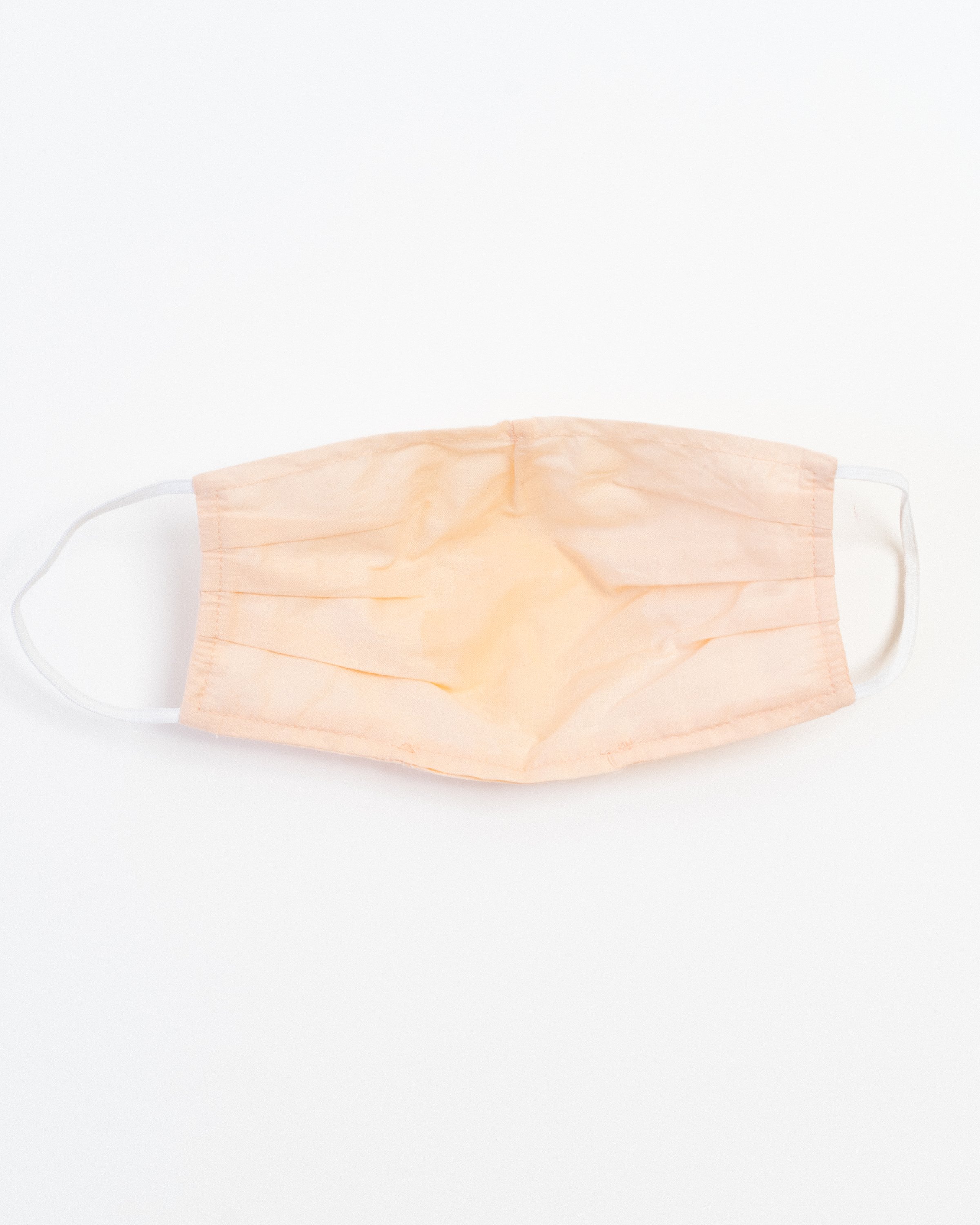 Blush Ultra-Light Face Mask made of breathable cotton with pleats for comfort and a filter pocket.