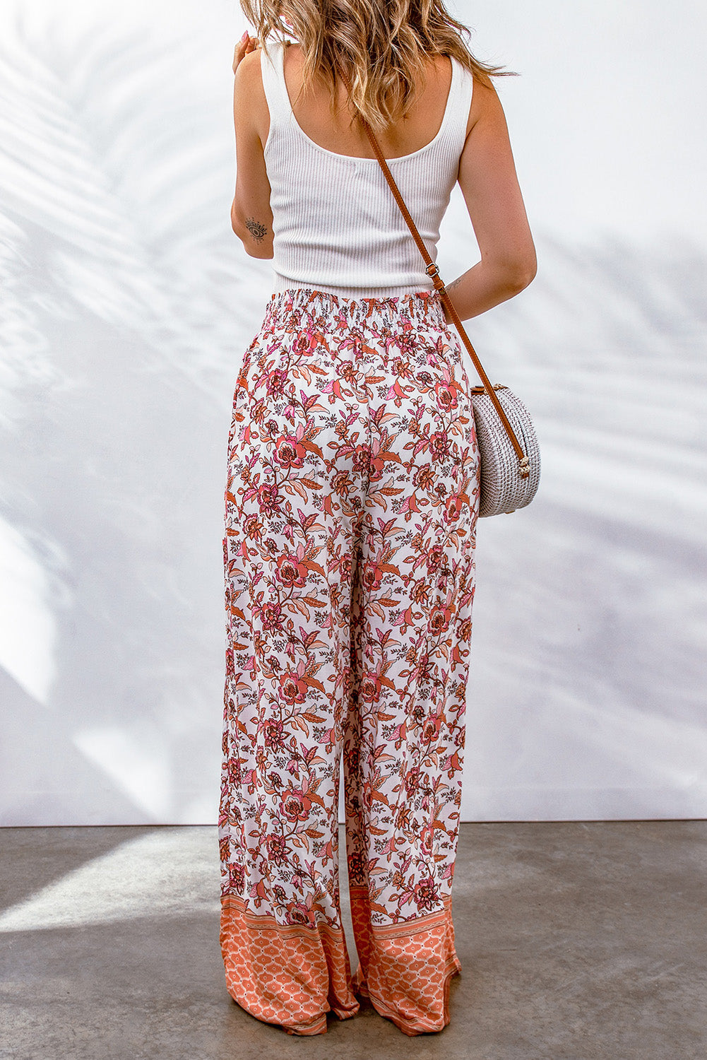 Bohemian Pleated Culottes featuring a floral pattern, made from 100% viscose, showcasing a long length and straight hem.