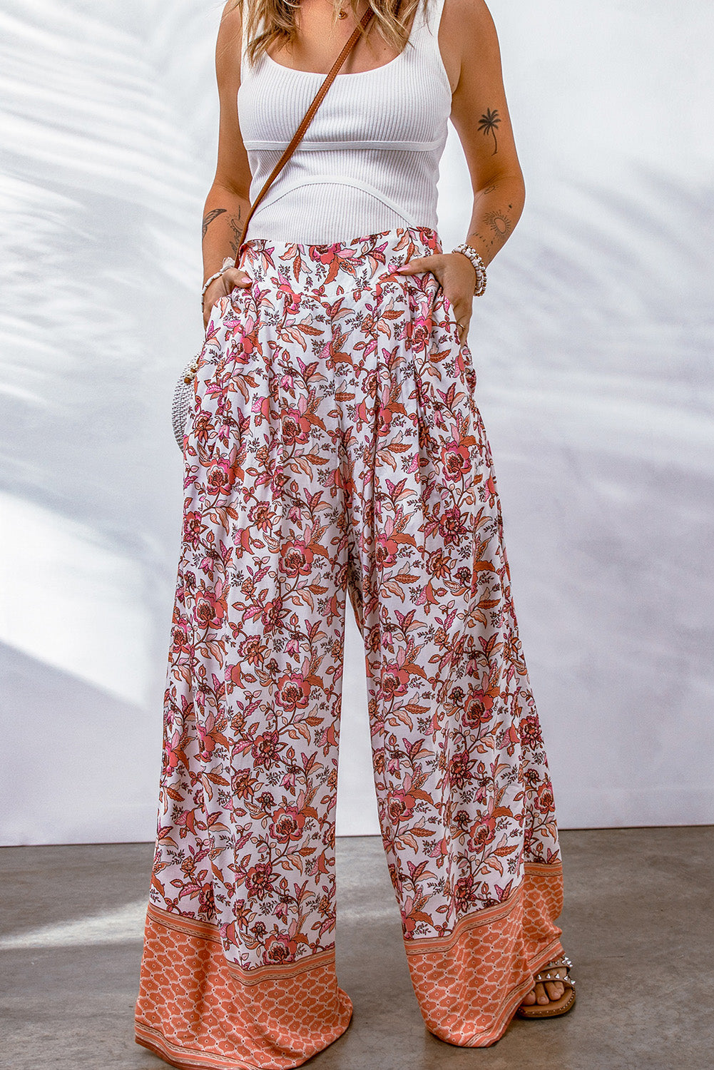 Bohemian Pleated Culottes featuring a floral pattern, made from 100% viscose, showcasing a long length and straight hem.