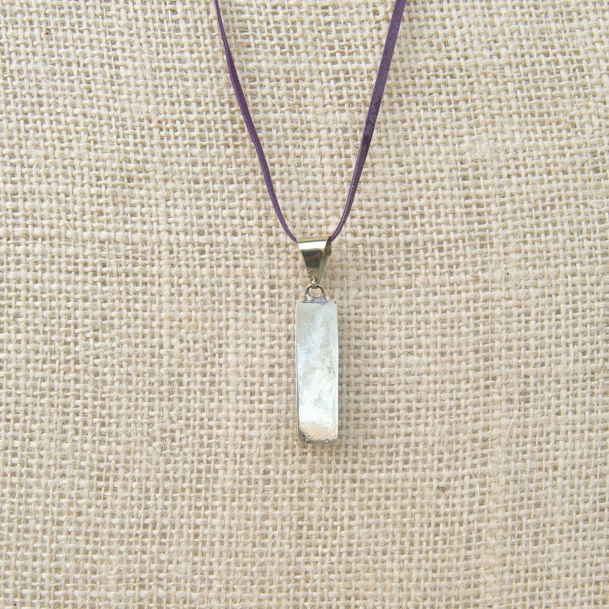 Boho Long Pendant Necklace featuring a rectangular pendant with unique geometric designs, handcrafted by artisans from Chiapas, Mexico.