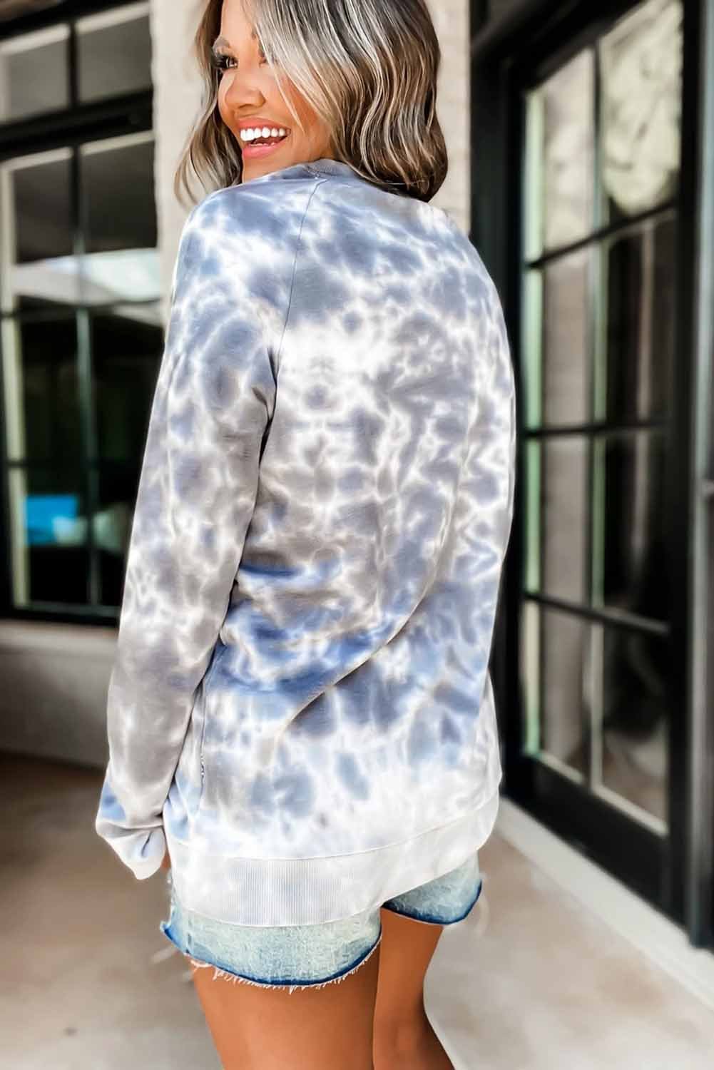 Bomba Ombre Tie-dyed Sweatshirt featuring vibrant colors and a loose fit, perfect for casual wear.