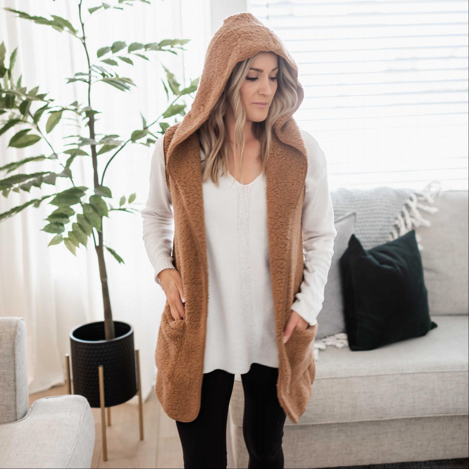 Both Sides Solid Soft Sherpa Hooded Vest in various colors, featuring a large hoodie and boxy pockets.