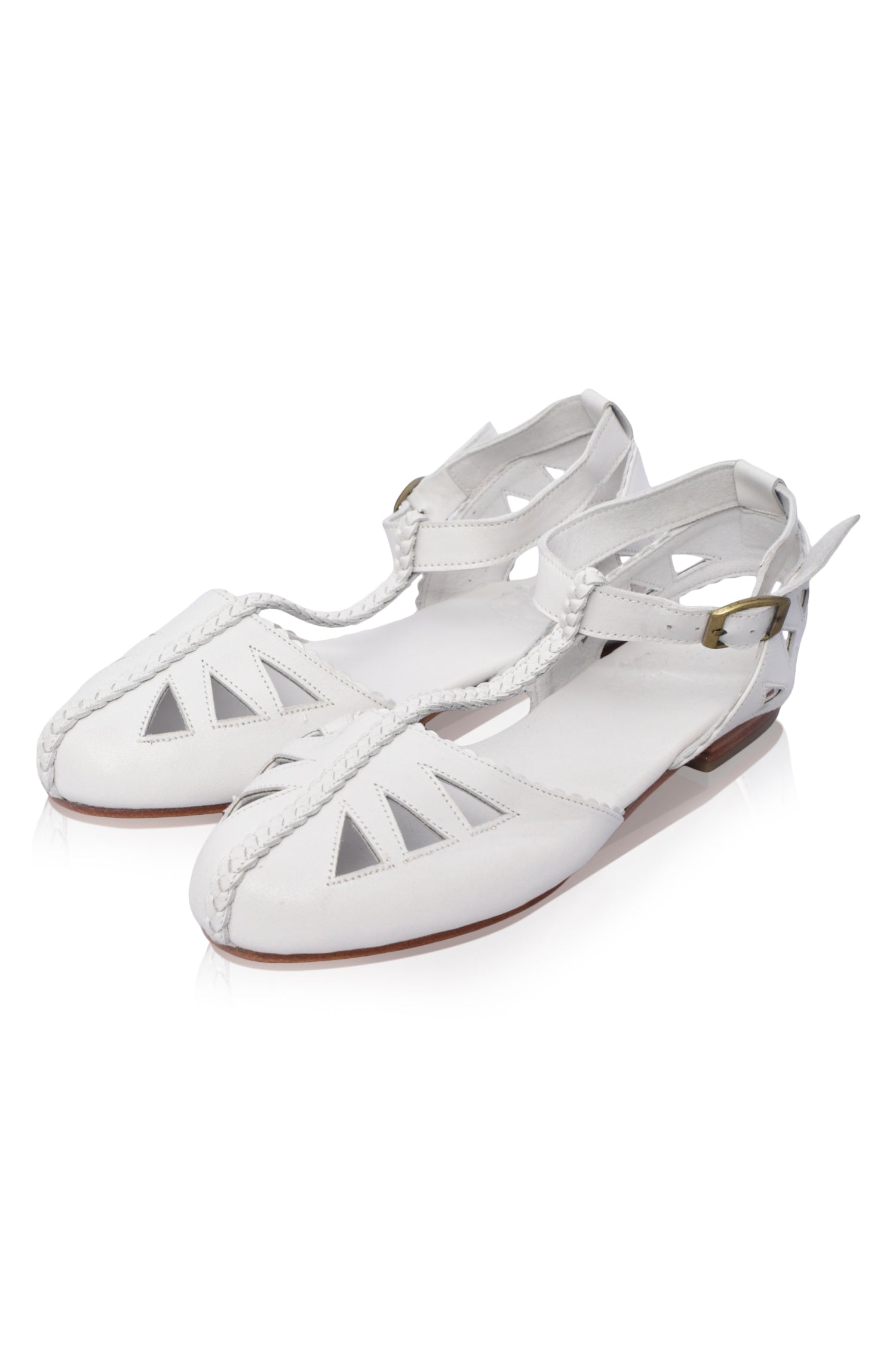 Bounty T-strap Leather Sandals showcasing round toe, cutouts, and scalloped edges in a stylish design.