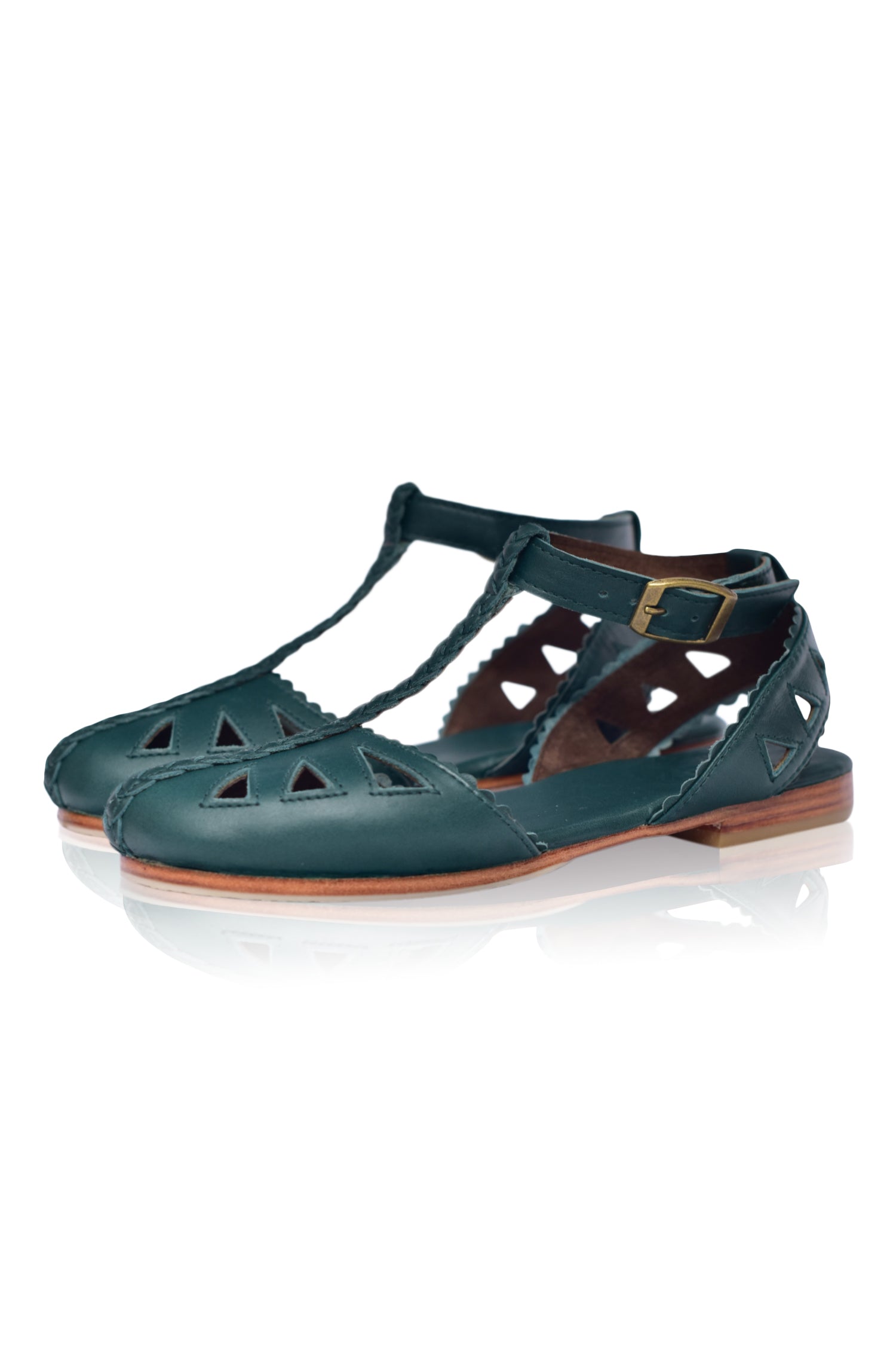 Bounty T-strap Leather Sandals showcasing a stylish design with round toe and scalloped edges, made from genuine leather.