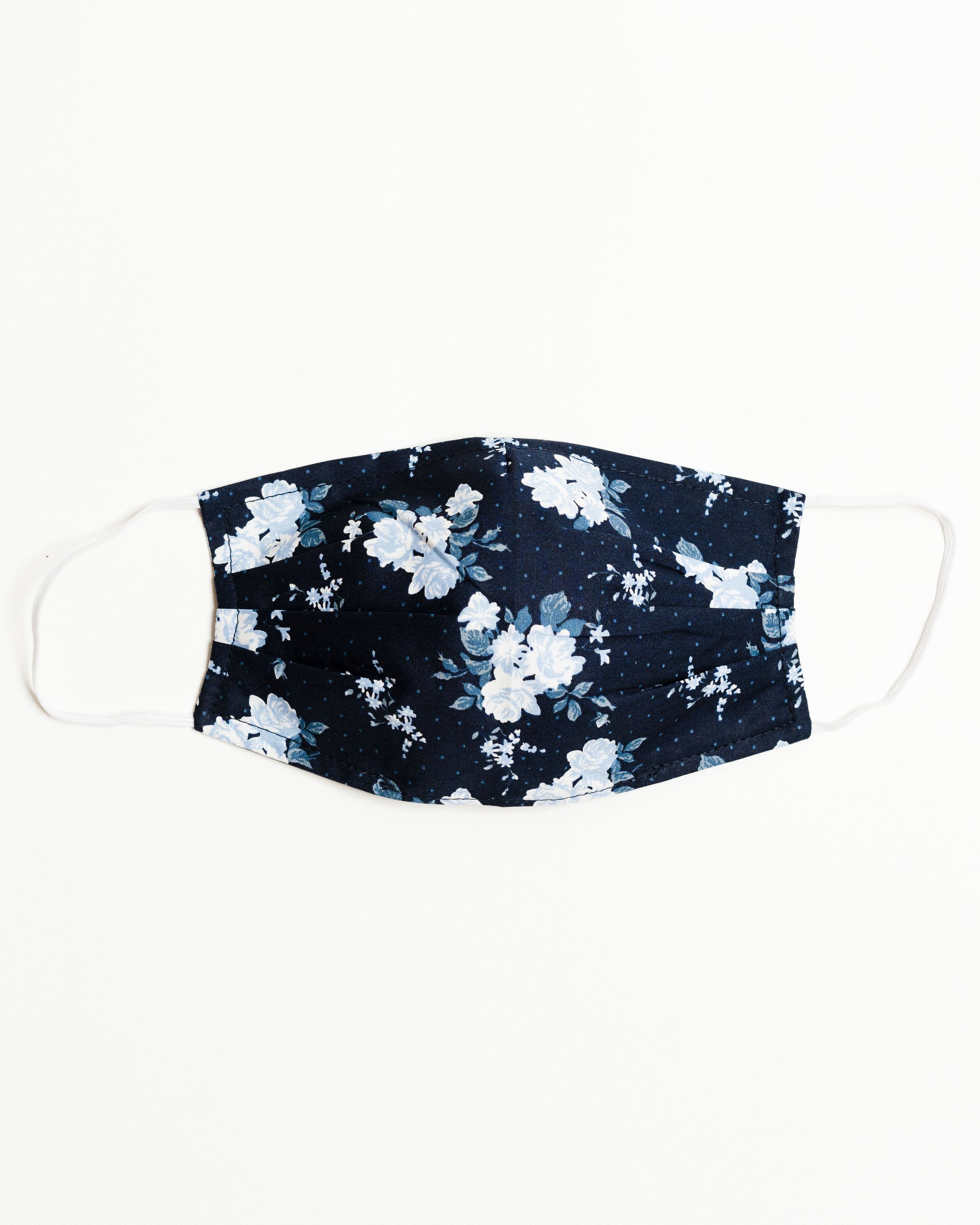 Bouquet Navy Face Mask made of breathable cotton with pleats for comfort and a filter pocket.