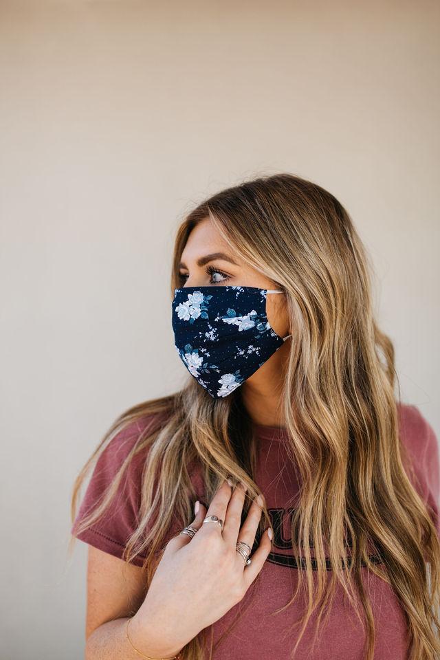 Bouquet Navy Face Mask made of breathable cotton with pleats for comfort and a filter pocket.