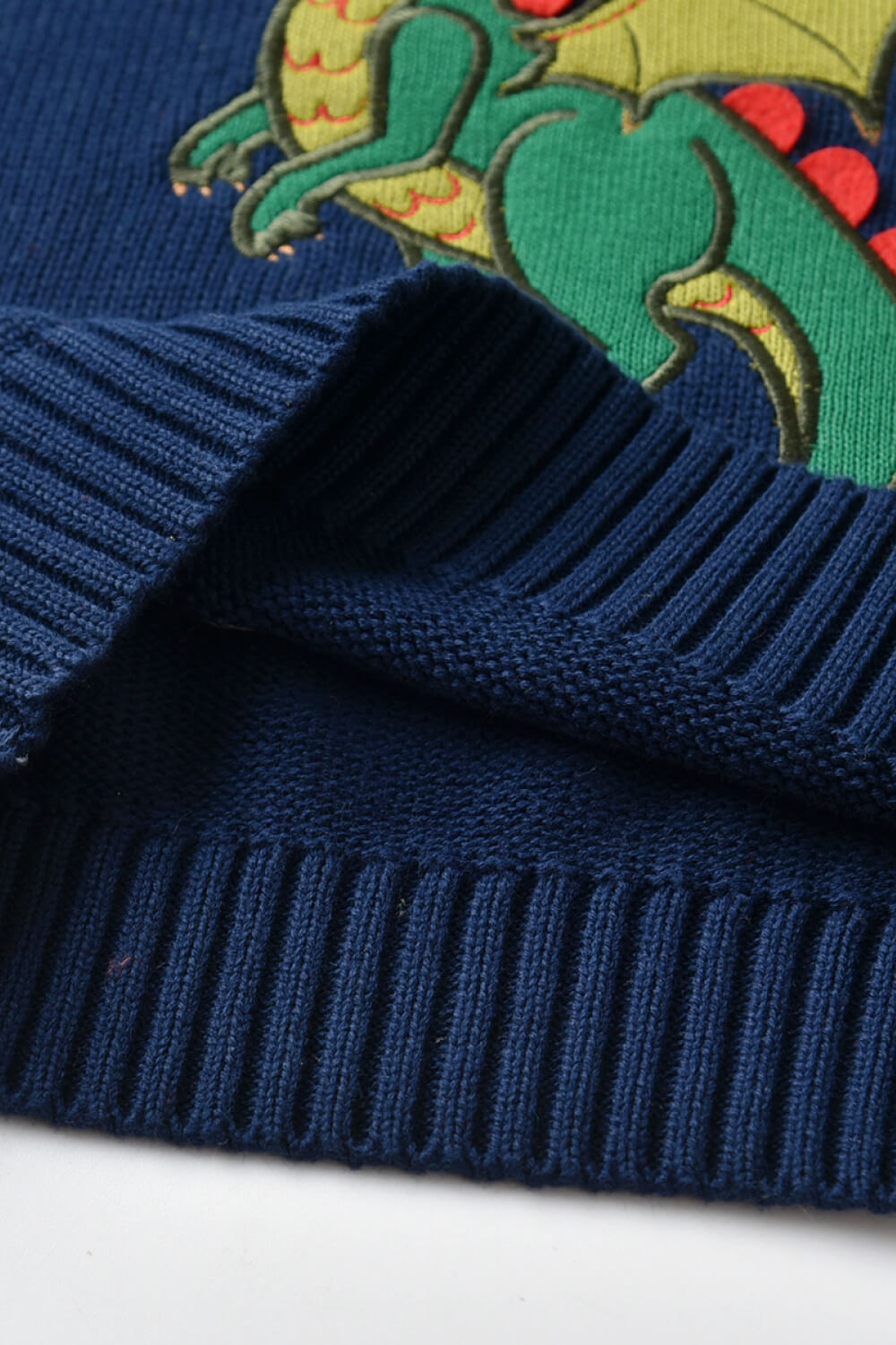 Boys Dinosaur Pattern Ribbed Trim Sweater in vibrant colors, featuring playful dinosaur designs, perfect for ages 1-6.