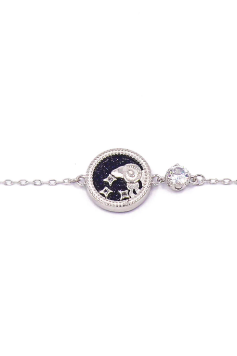 Elegant silver bracelet featuring an ARIES horoscope sign pendant, perfect for stylish outfits.