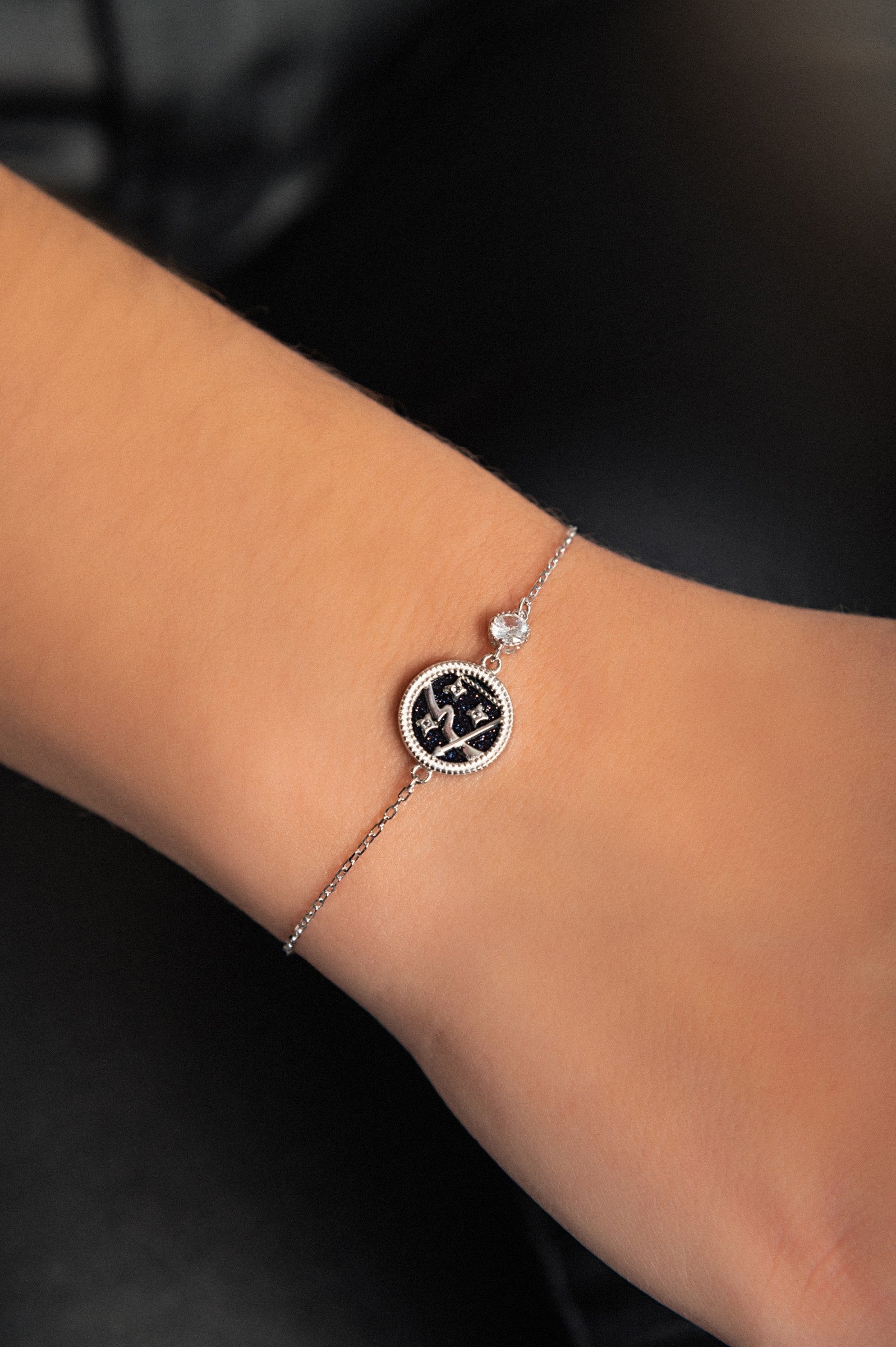 Elegant silver bracelet featuring a SAGITTARIUS zodiac sign pendant, showcasing intricate design and quality craftsmanship.