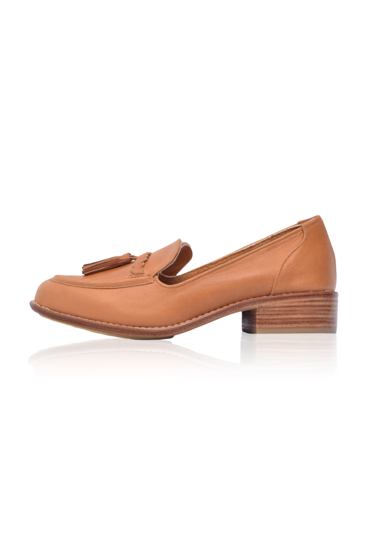 A pair of stylish Brooklyn leather loafers featuring braid and tassel details, made from 100% genuine leather.