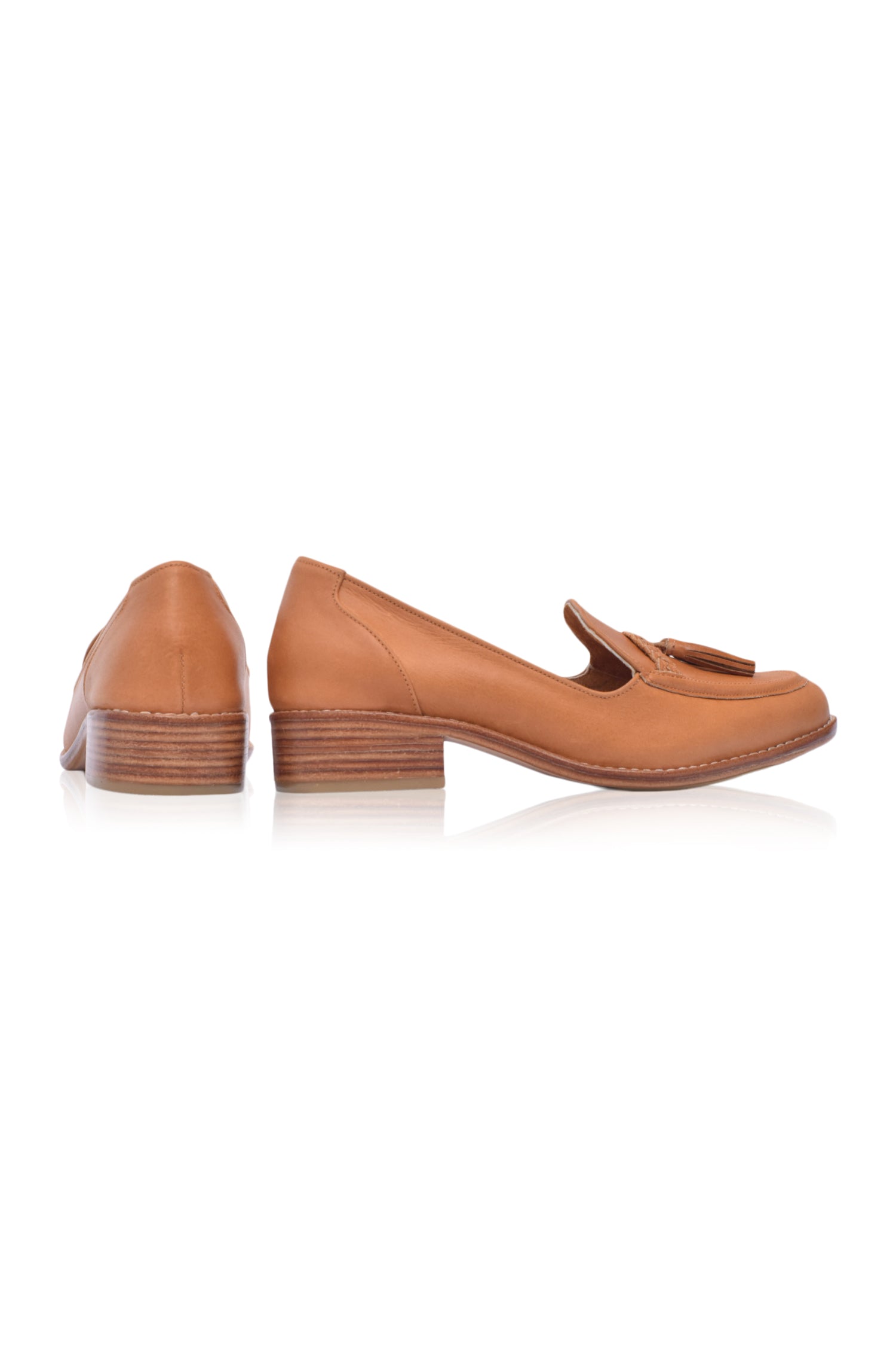 A pair of stylish Brooklyn leather loafers featuring braid and tassel details, made from 100% genuine leather.