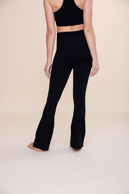 BRONZE Ribbed Flare High-Waist Leggings showcasing a stylish ribbed texture and flattering high-waist design.