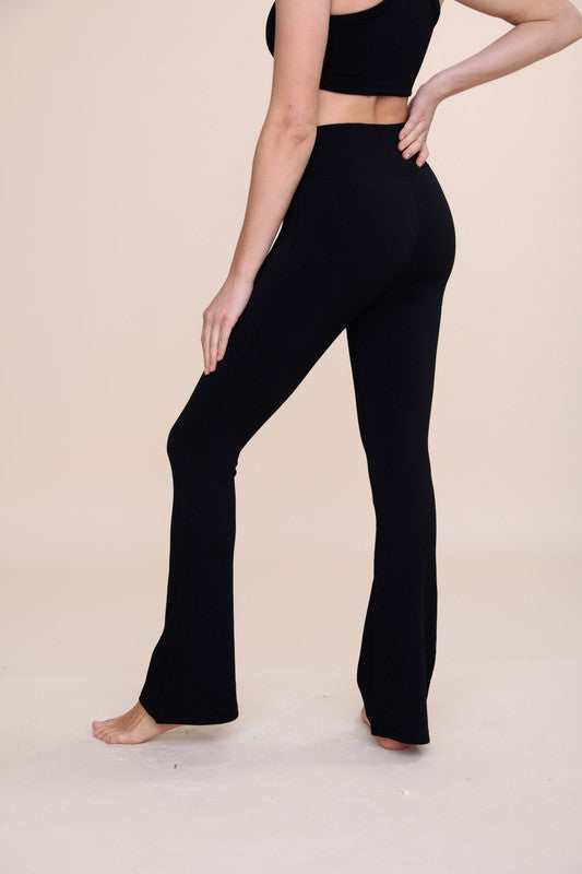 BRONZE Ribbed Flare High-Waist Leggings showcasing a stylish ribbed texture and flattering high-waist design.