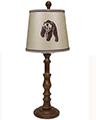 Brown traditional table lamp with a bear printed shade, showcasing its elegant design and warm lighting.