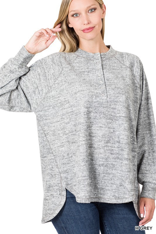 Brushed Melange Raglan Sleeve Sweater in various colors, showcasing its soft fabric and relaxed fit.