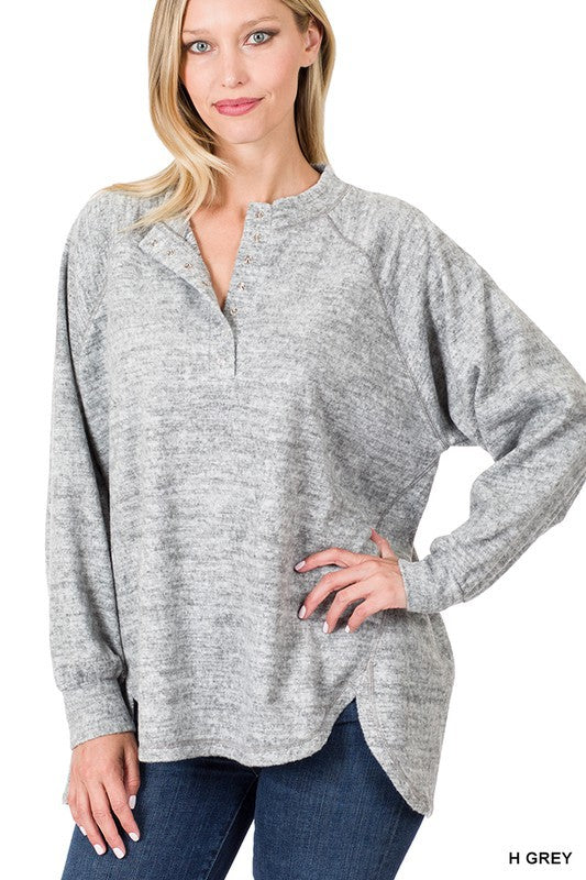 Brushed Melange Raglan Sleeve Sweater in various colors, showcasing its soft fabric and relaxed fit.