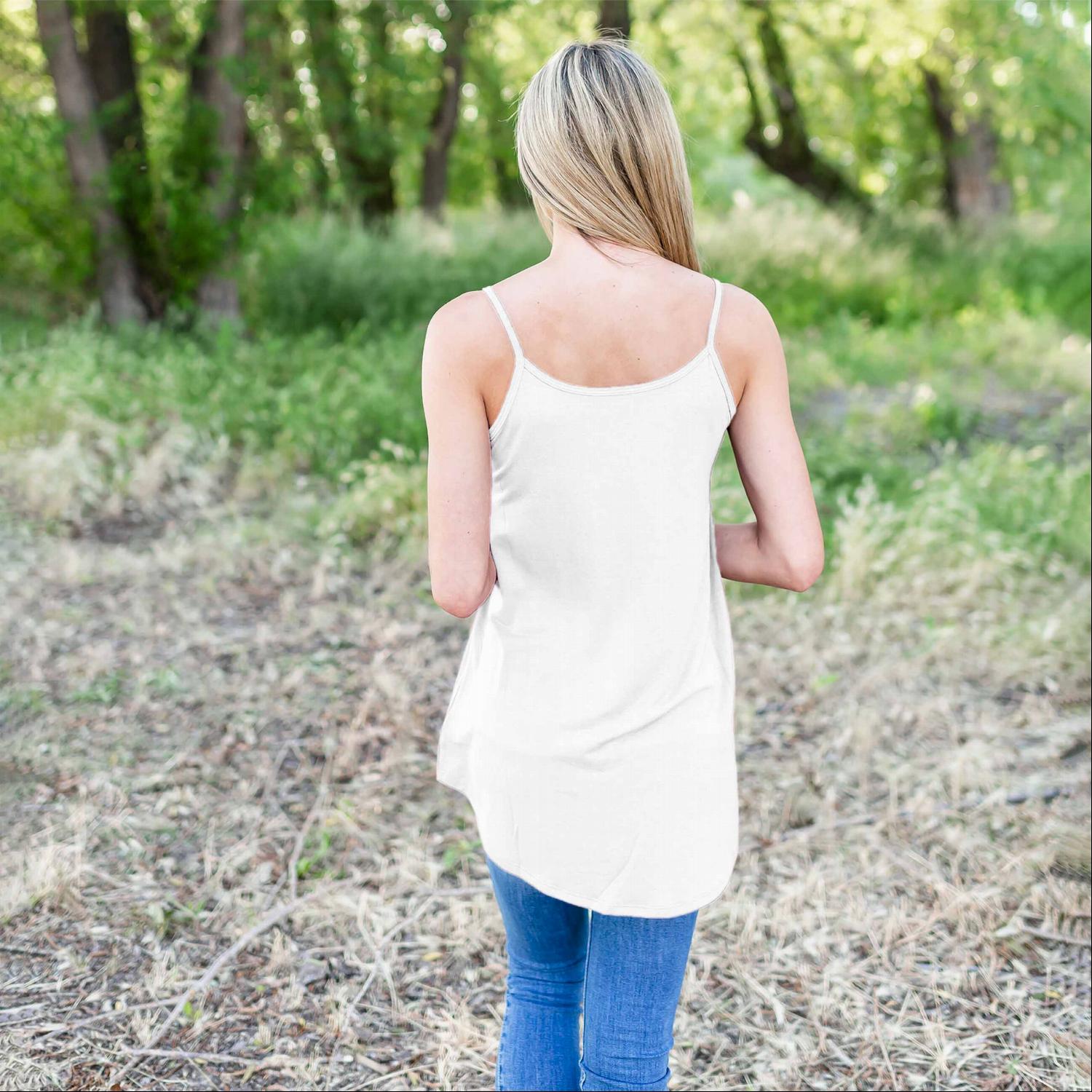 A stylish Bubble Crepe Camisole Top featuring spaghetti straps and a tunic length, perfect for summer outfits.